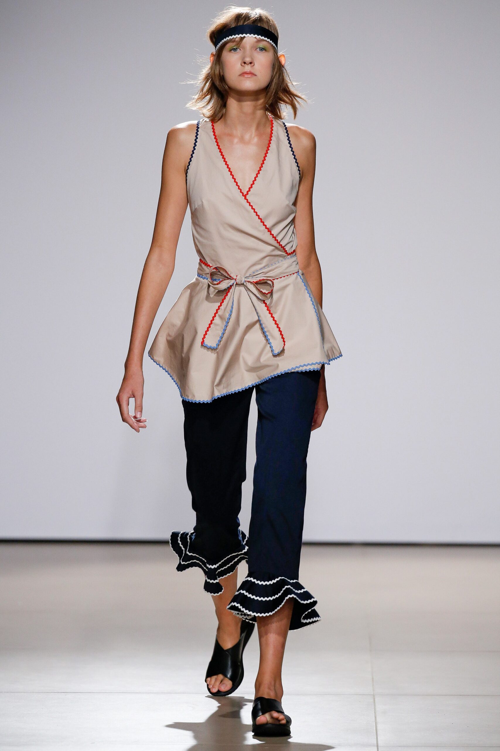 beige wrap top with flared pants