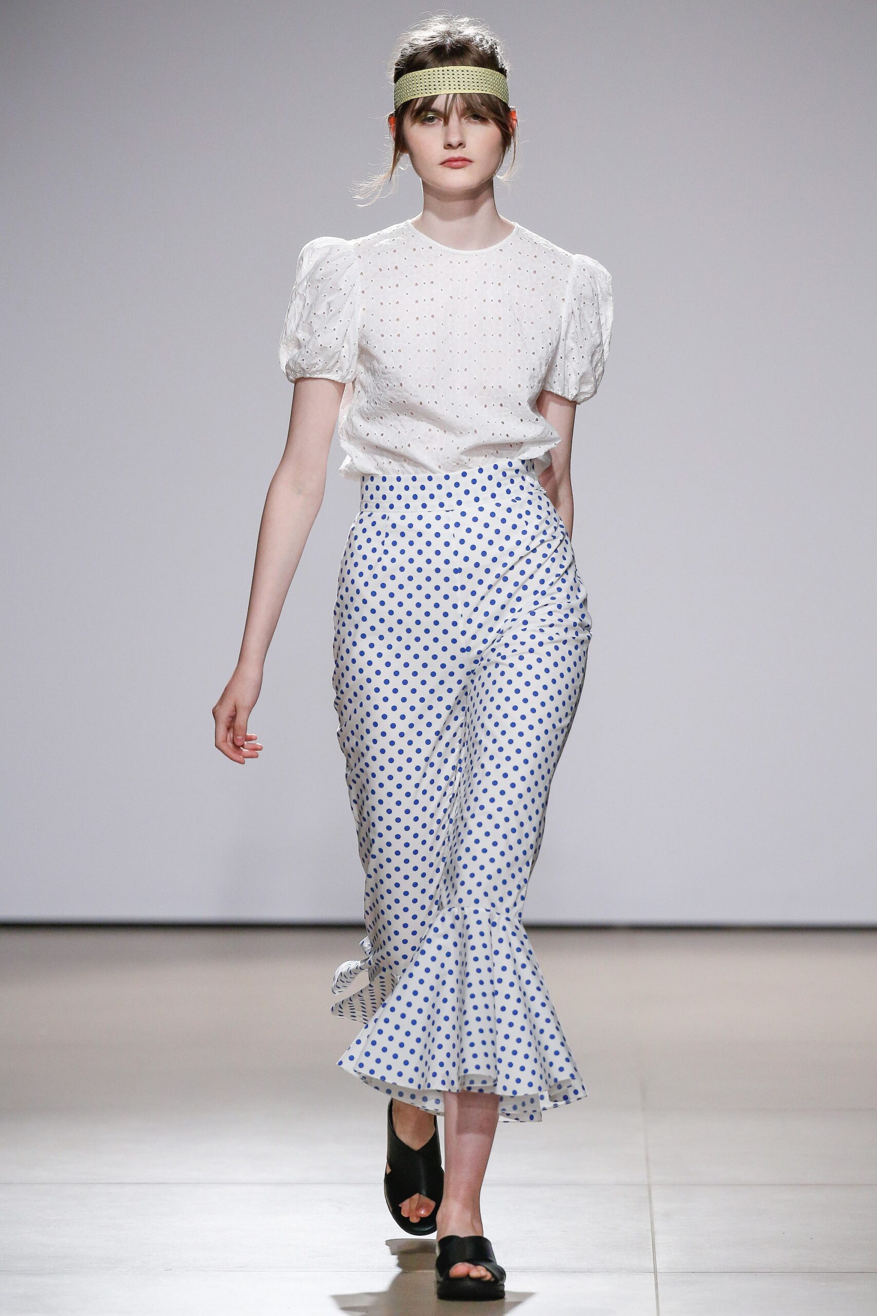 white fitted blouse with blue polka-dot pants