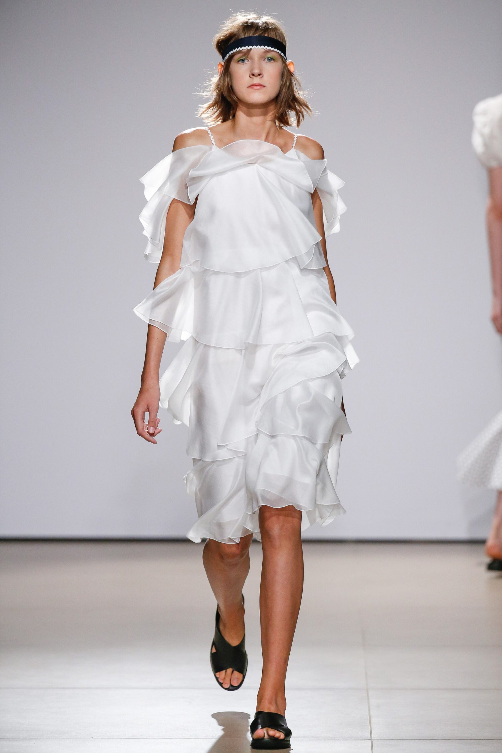 white ruffled off-shoulder dress