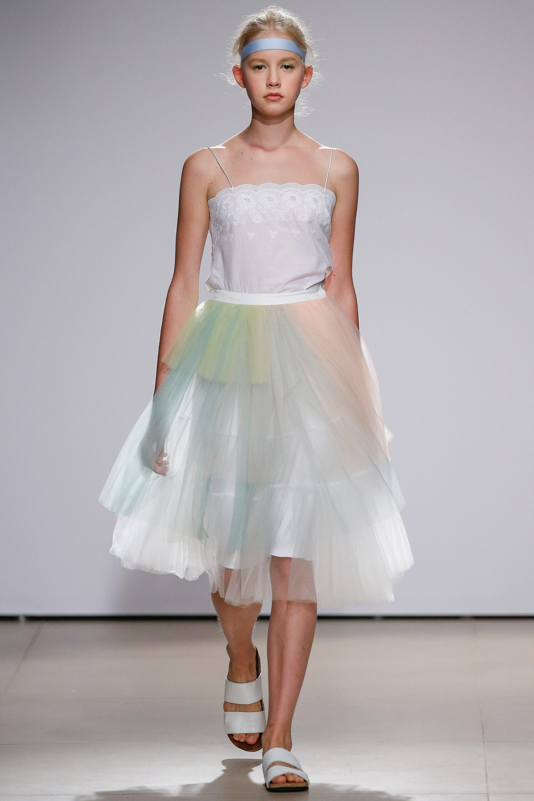 white embroidered top with multi tulle skirt