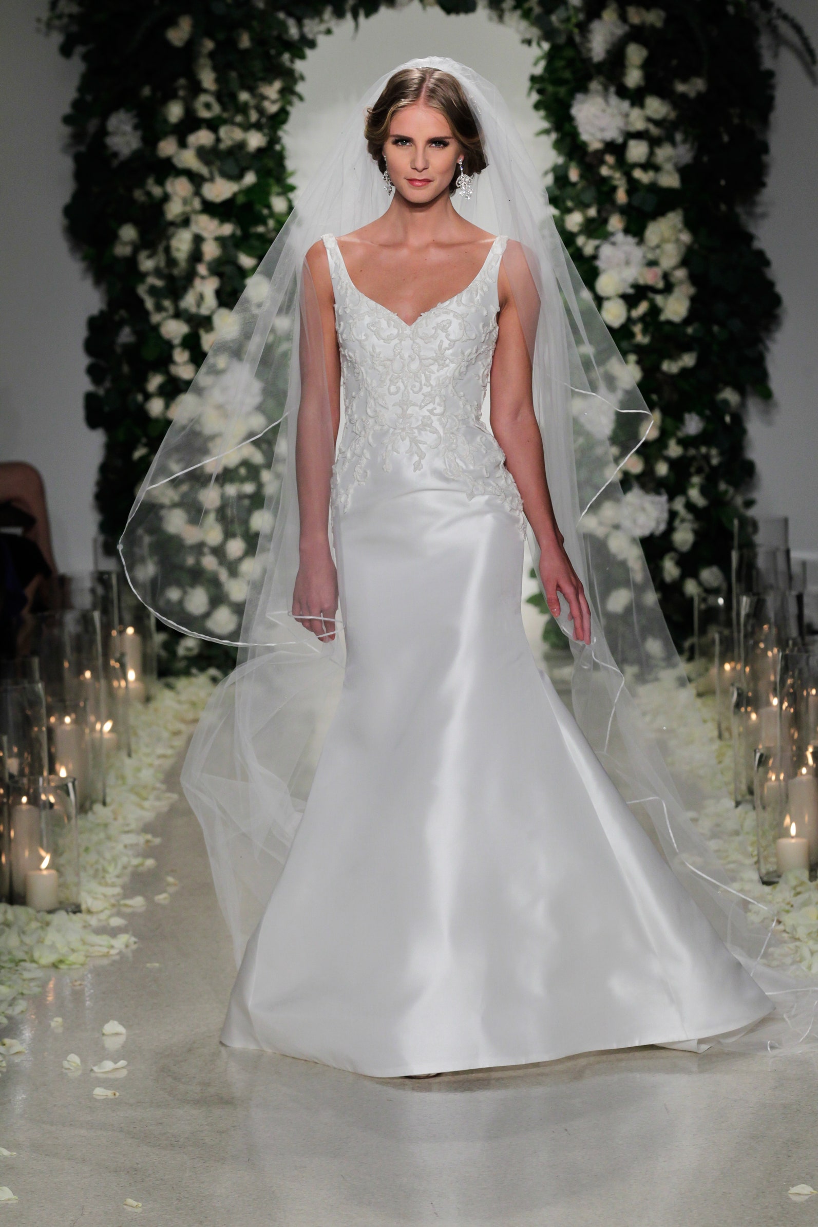 white silk fitted gown with veil