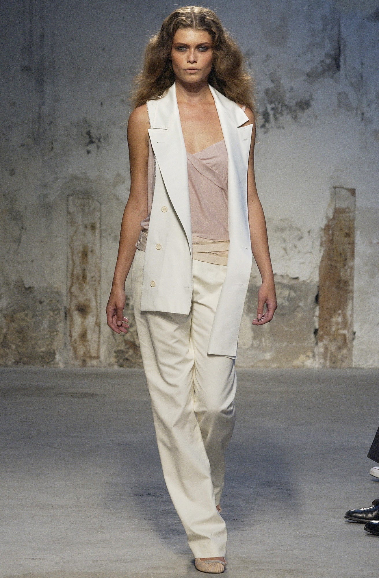 white tailored blazer with beige pants