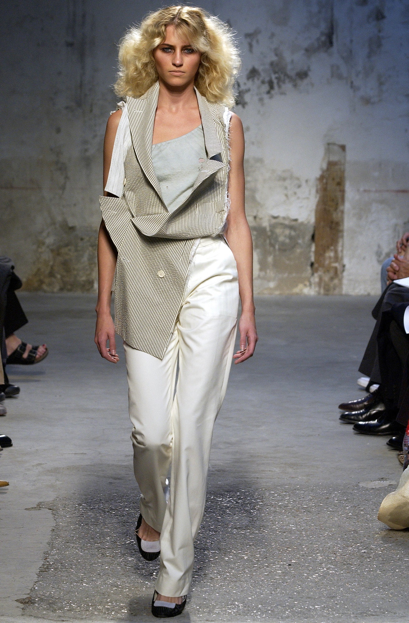 asymmetric white and black blazer with slim pants