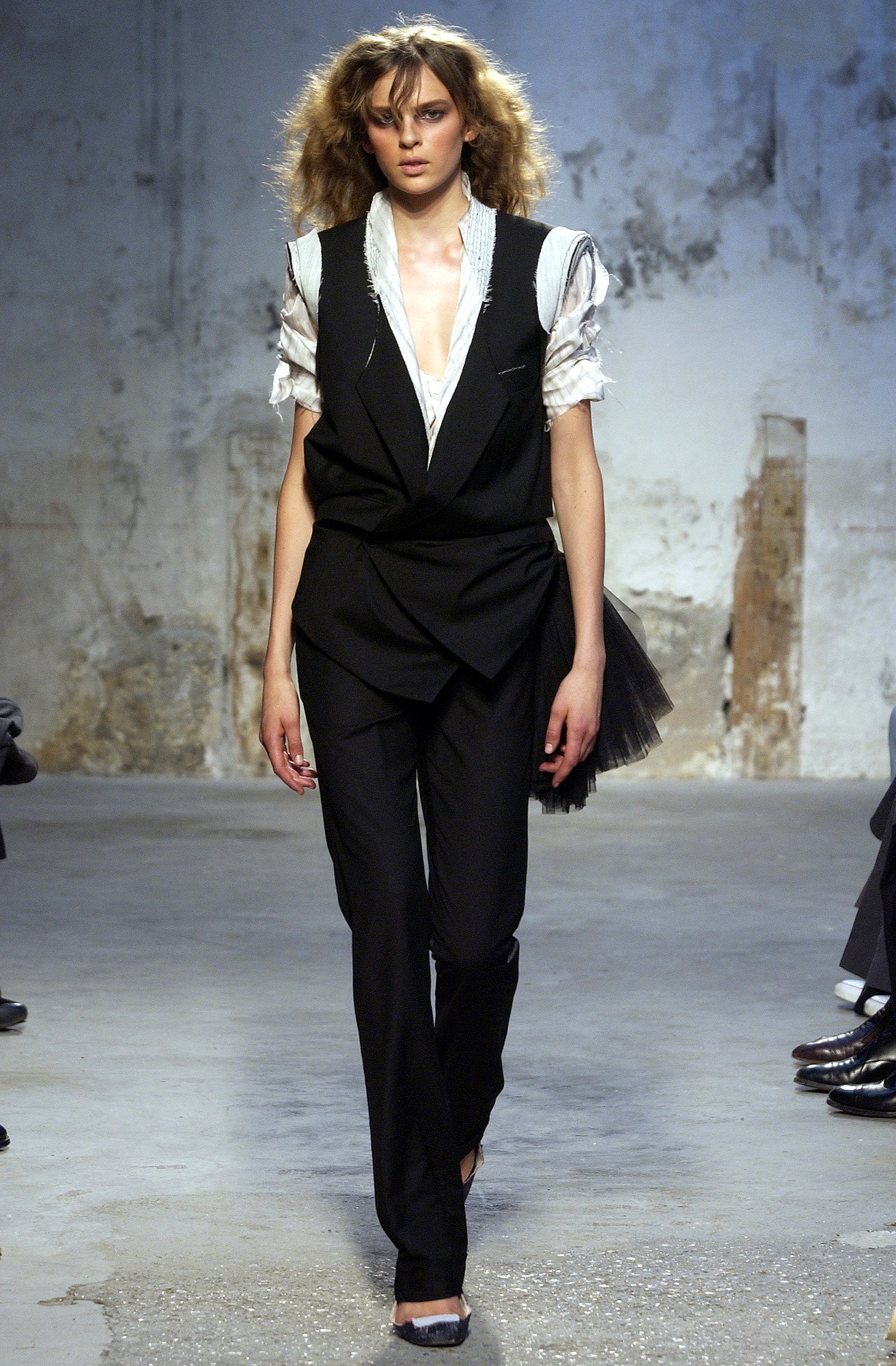 black tailored suit with white blouse