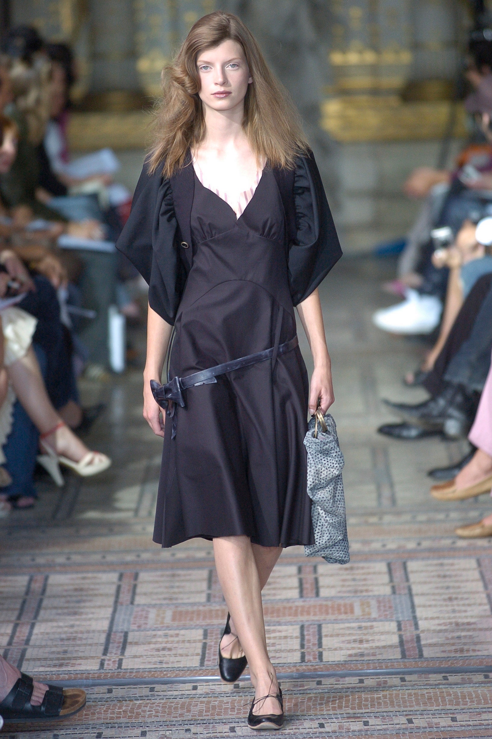 black silk fitted dress with cape