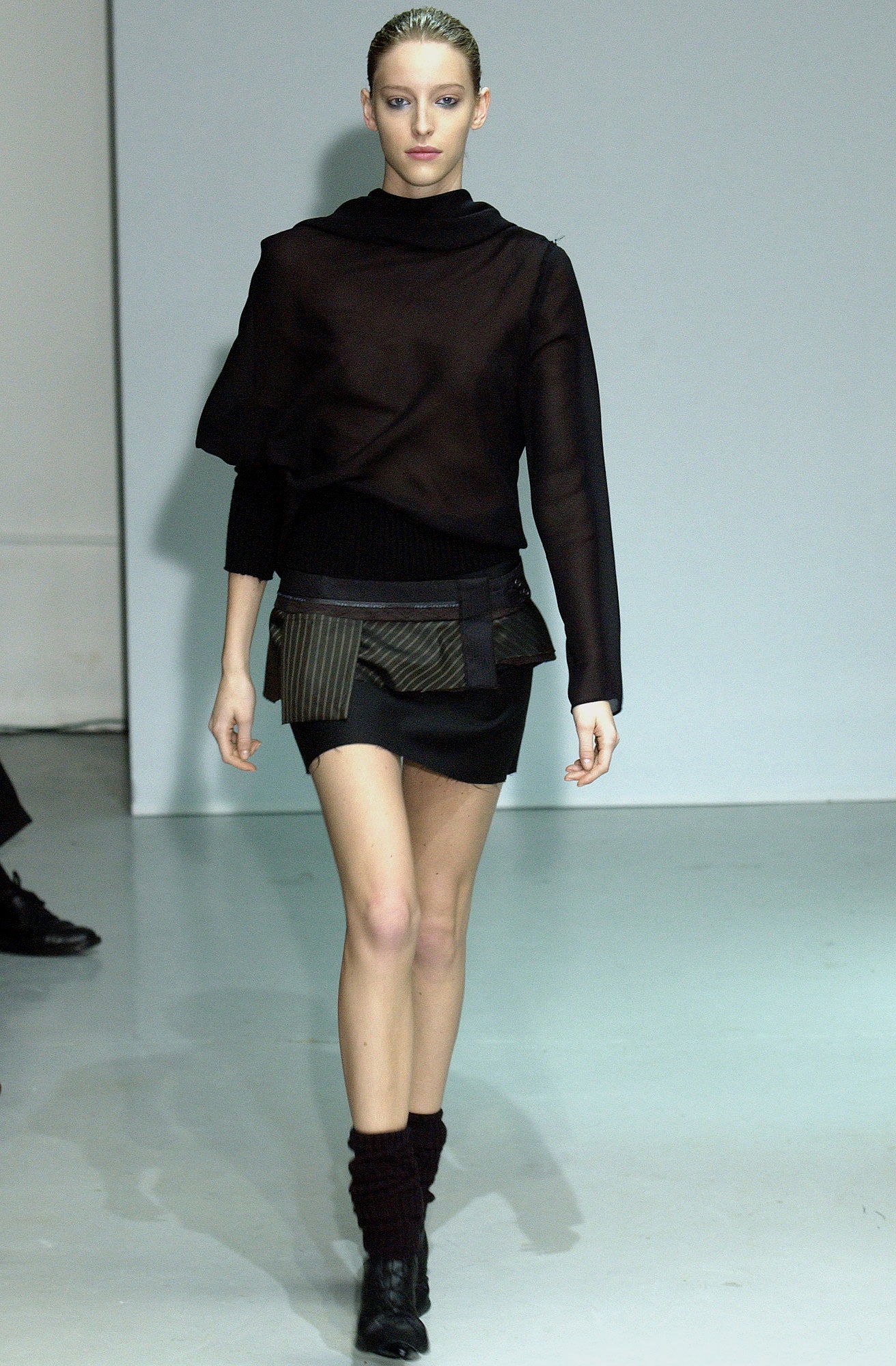 black sheer top and mini skirt