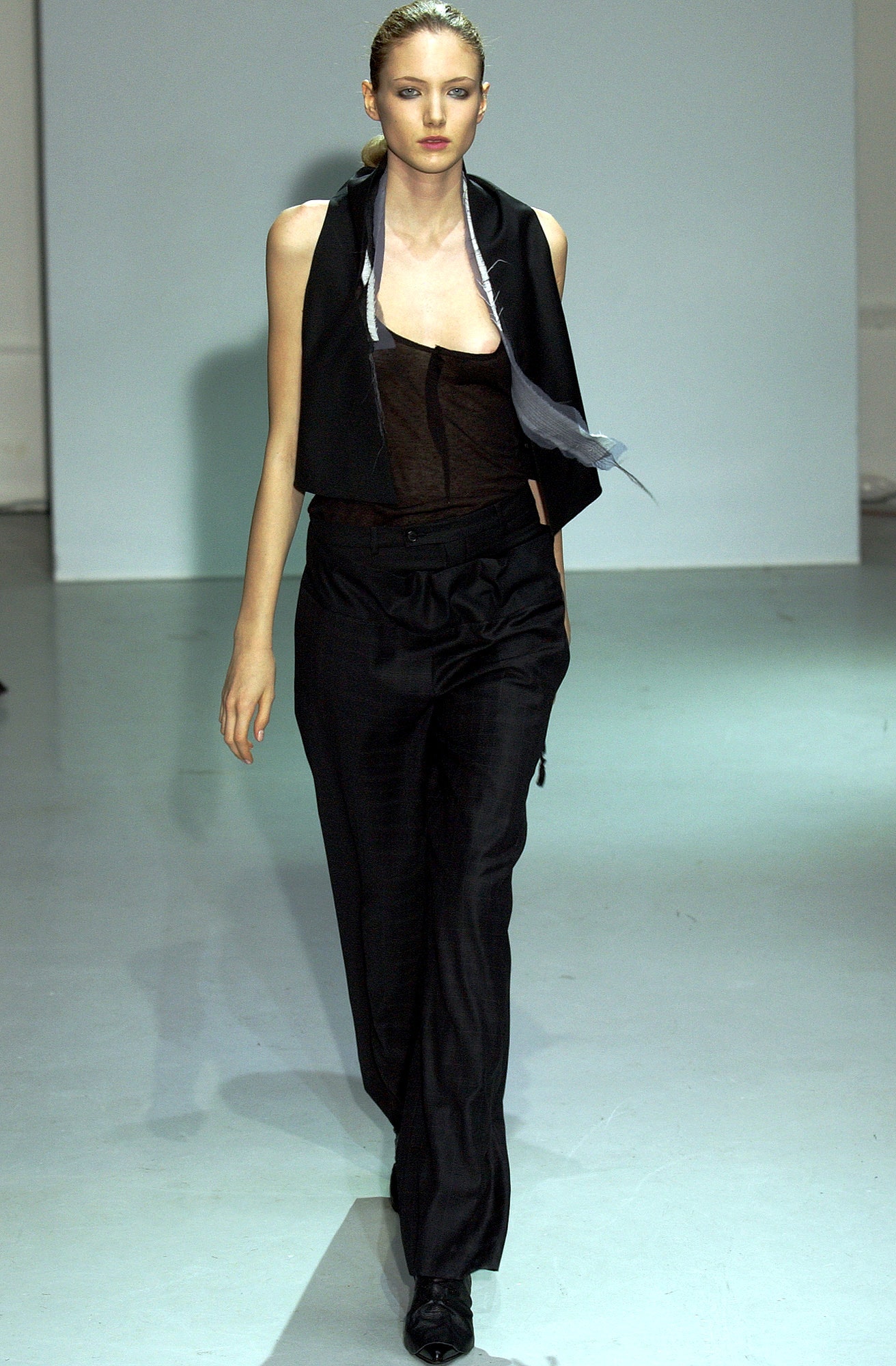 black silk fitted blazer and relaxed pants
