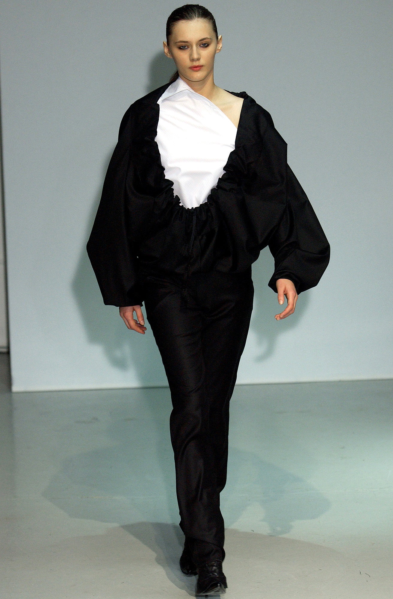 black and white relaxed top with fitted pants