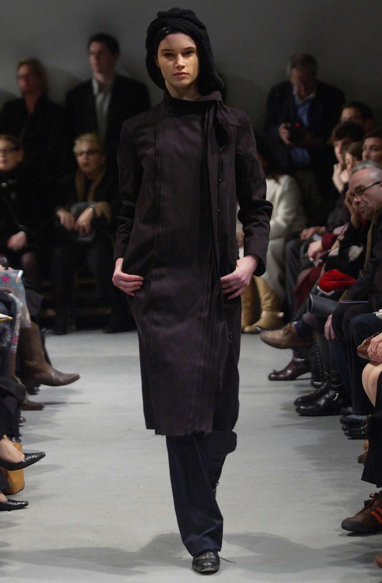 black wool long-sleeve collared fitted buttoned pleated coat