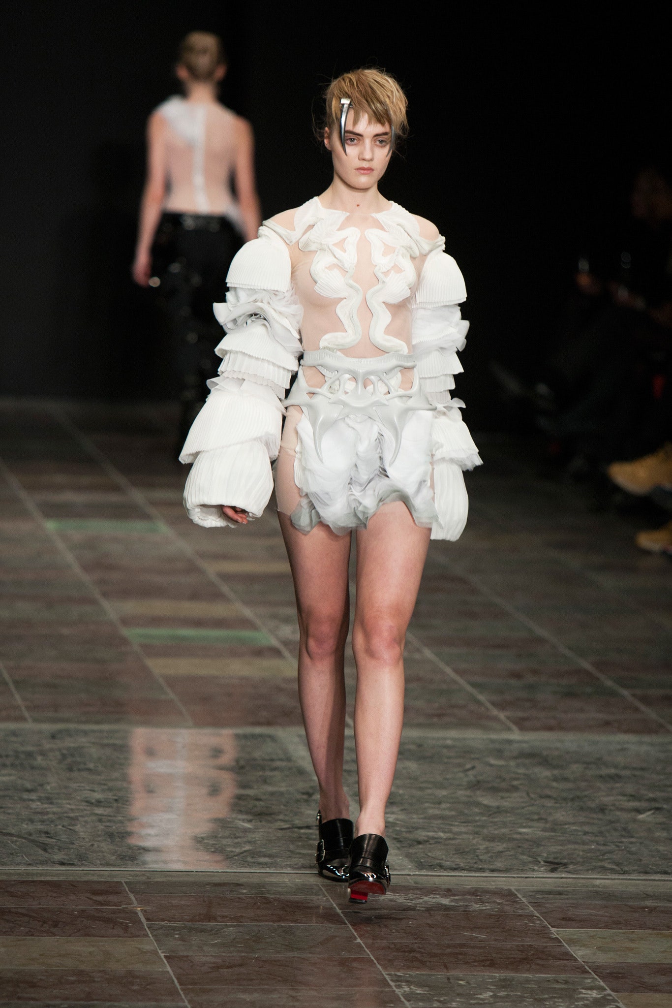 white ruffled bodysuit and shorts