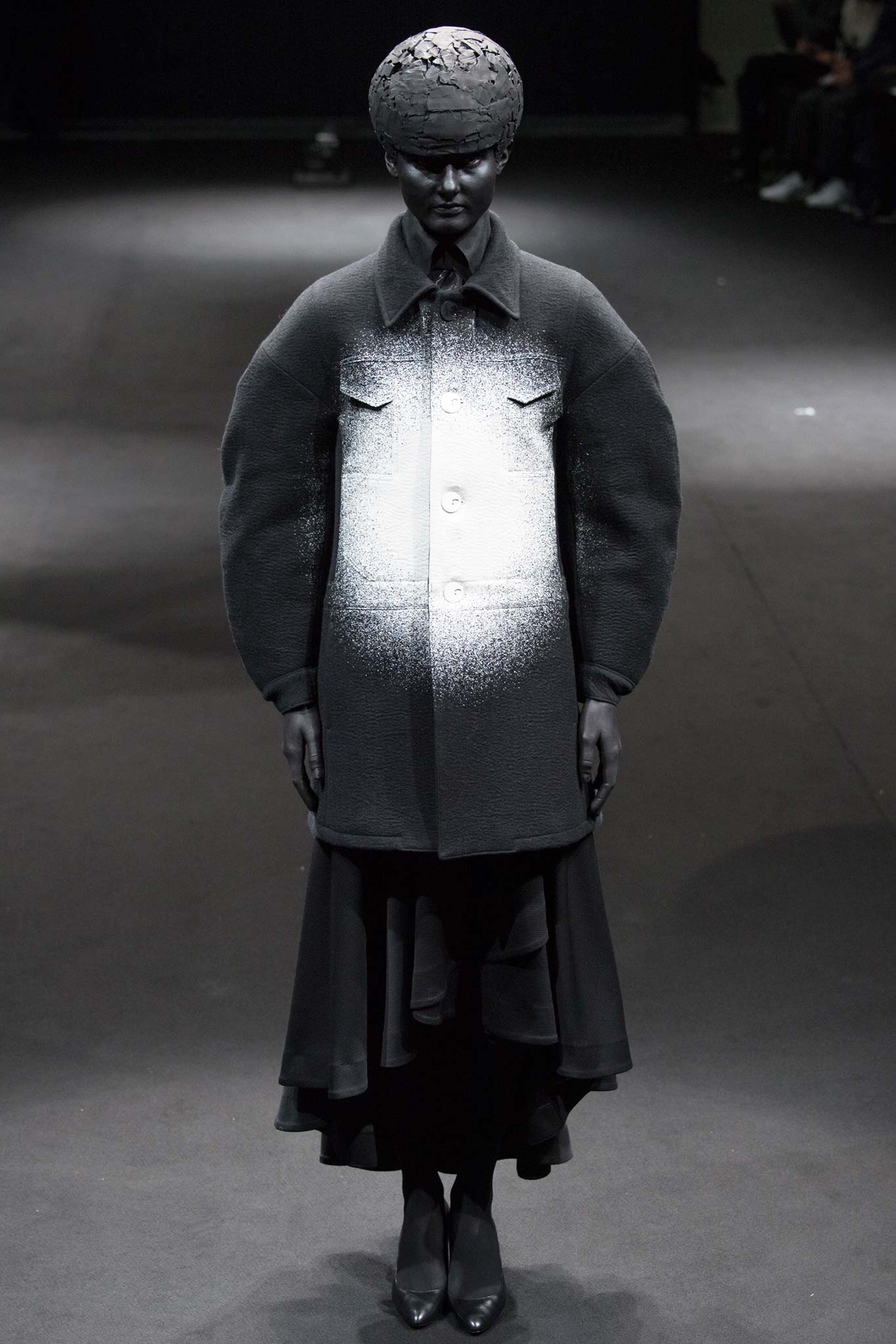 black wool long-sleeve collared oversized buttoned layered coat