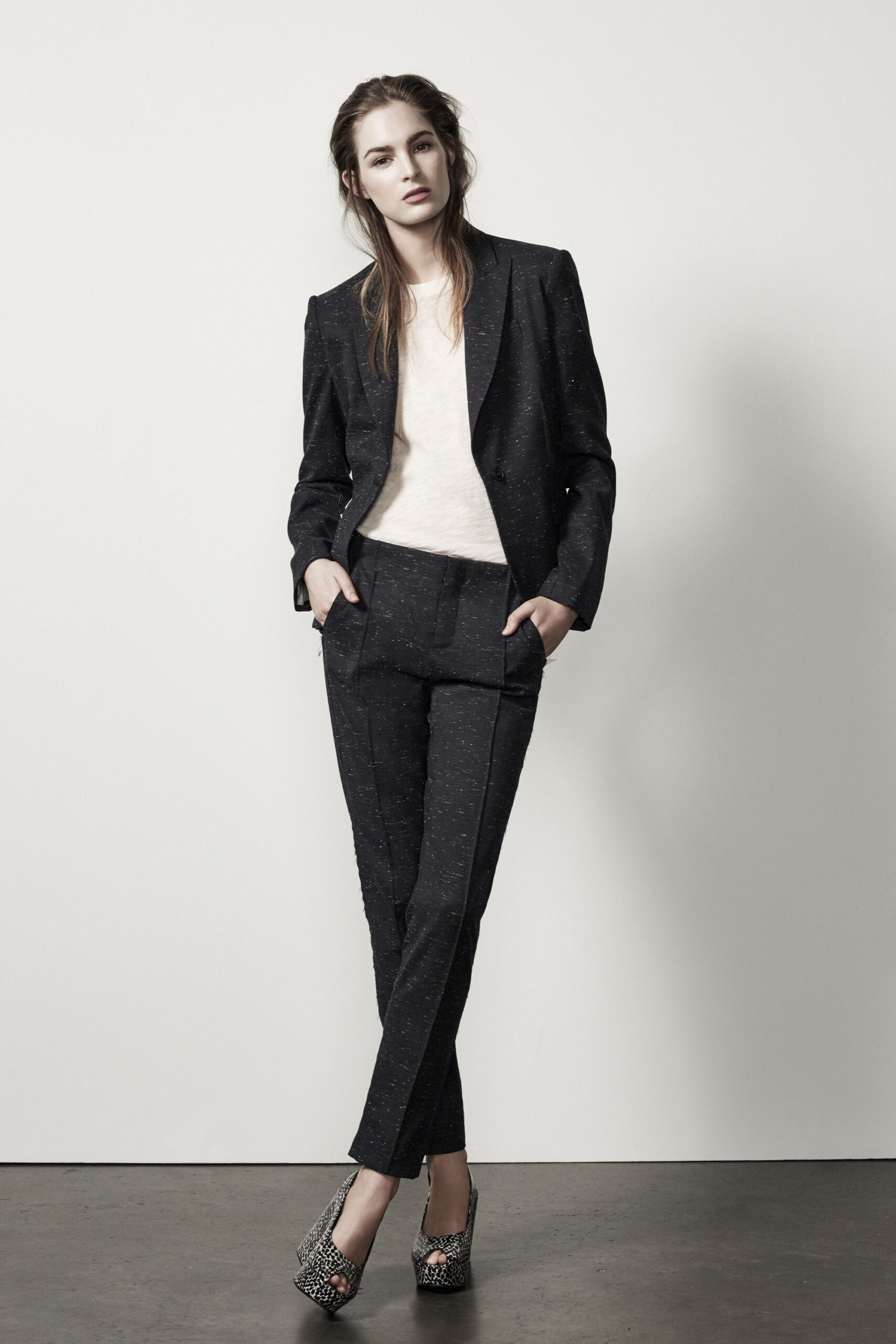 black tailored suit with white top