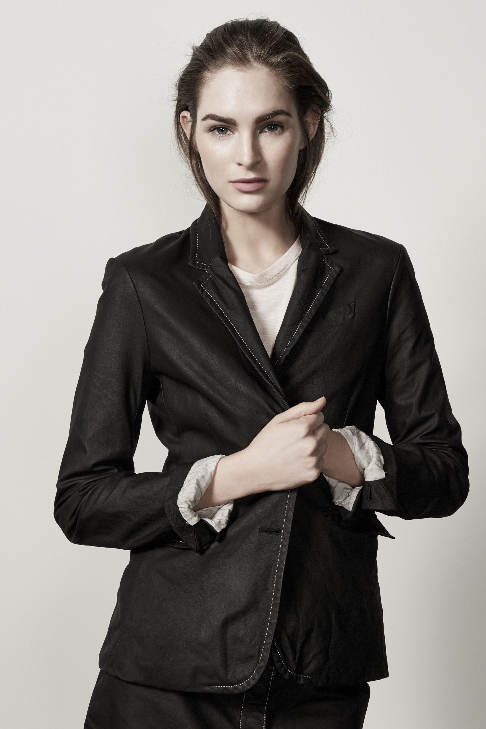 black leather fitted blazer and white t-shirt