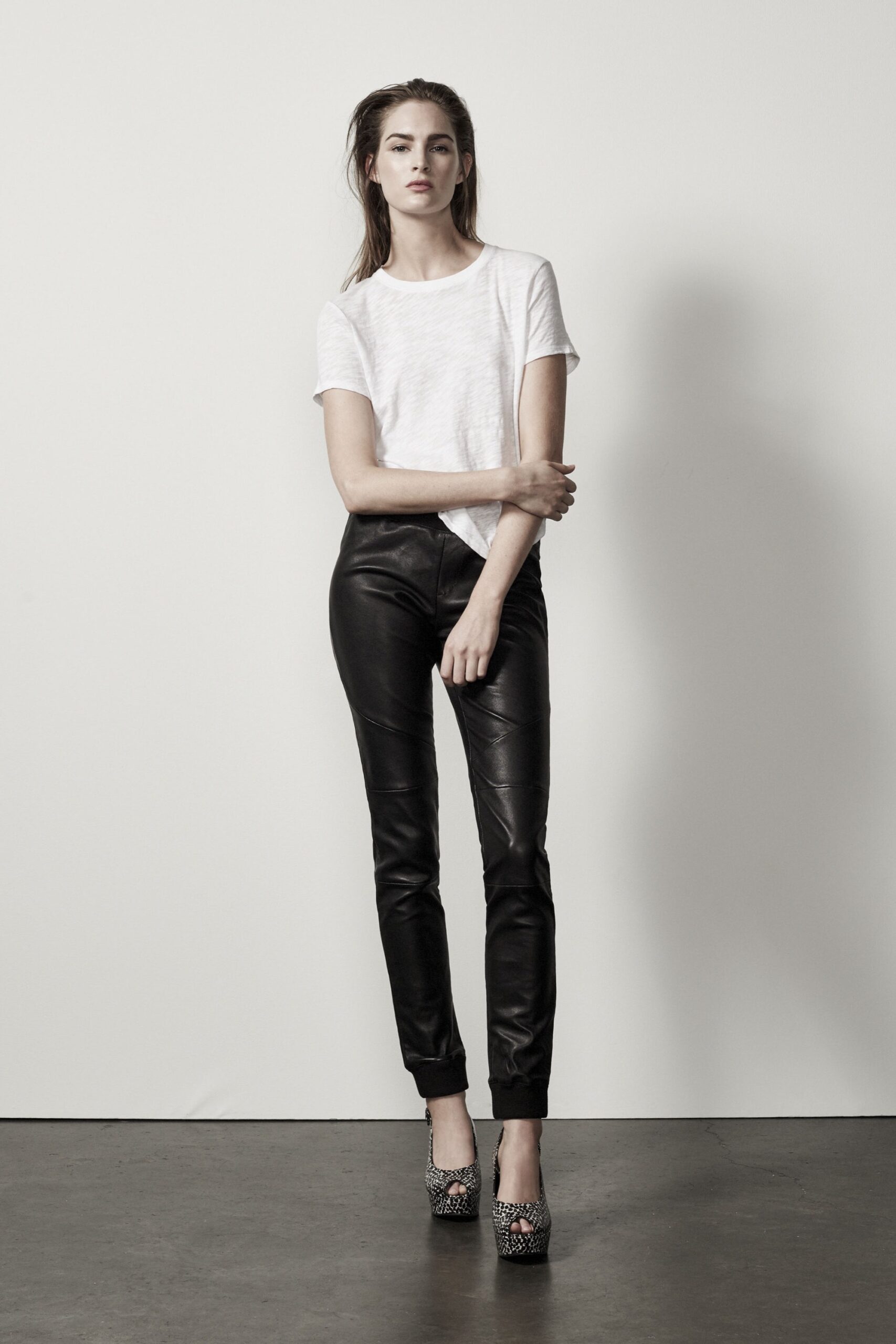 white t-shirt black leather pants