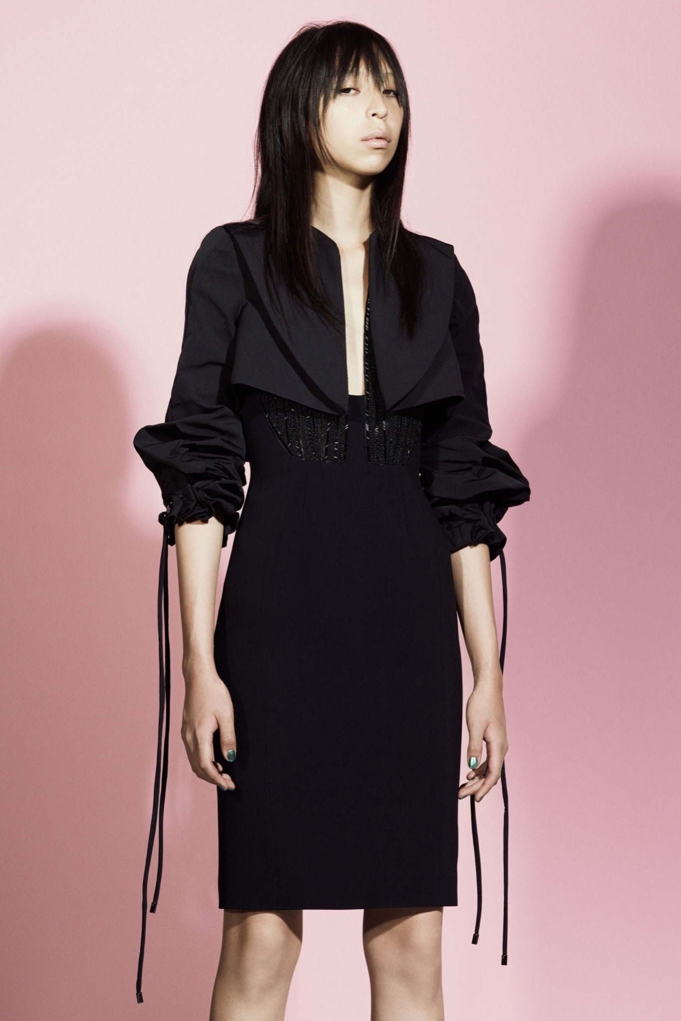 black fitted mini dress with structured jacket