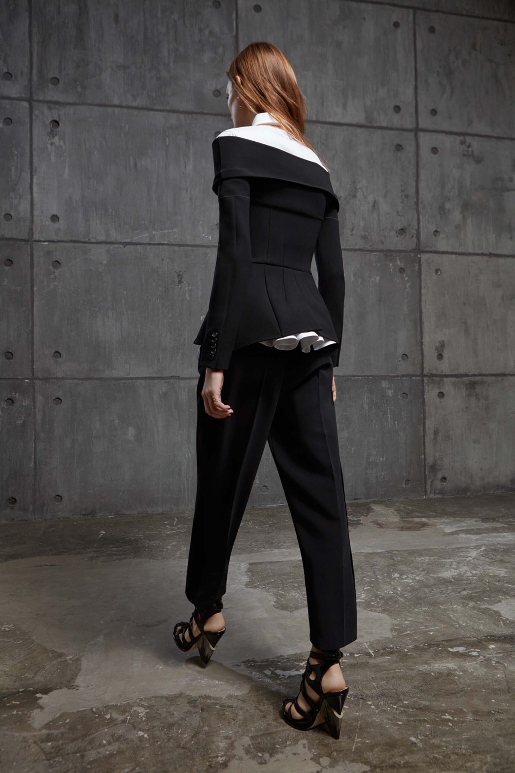 black and white tailored blazer with slim pants