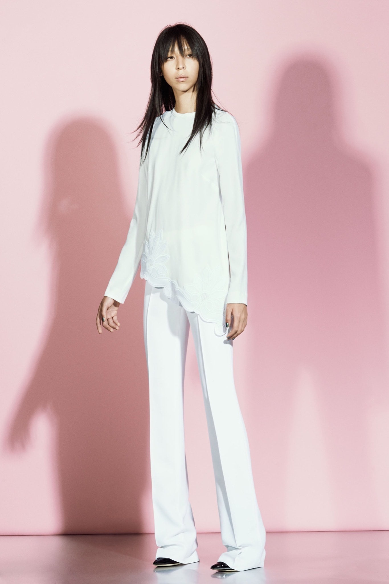 white silk relaxed top and flared pants