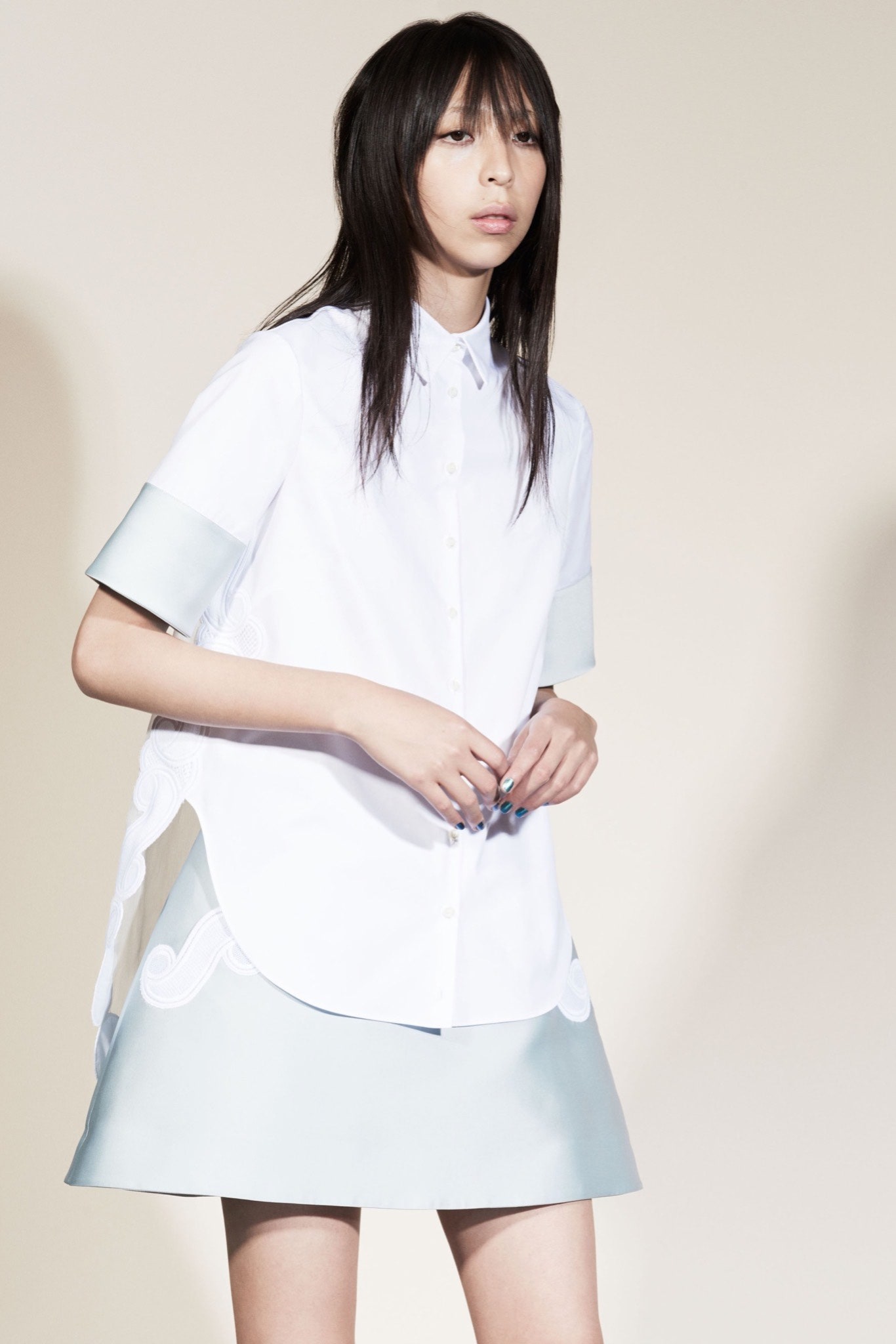 white cotton shirt with blue skirt