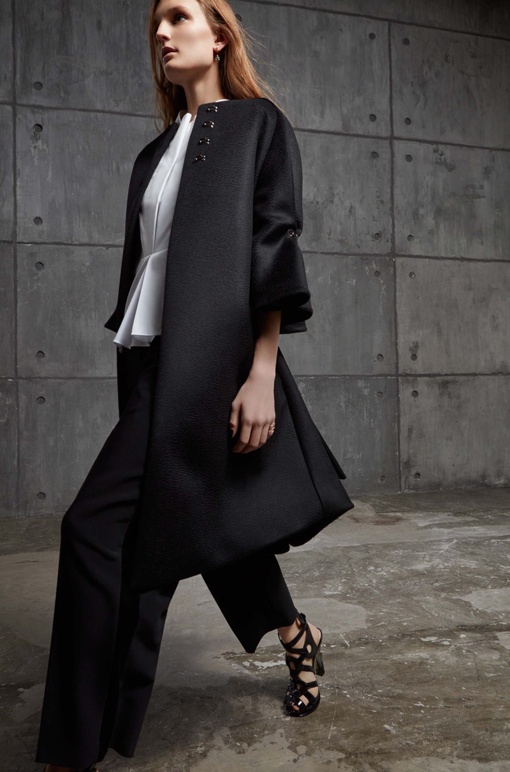 black wool coat with white blouse