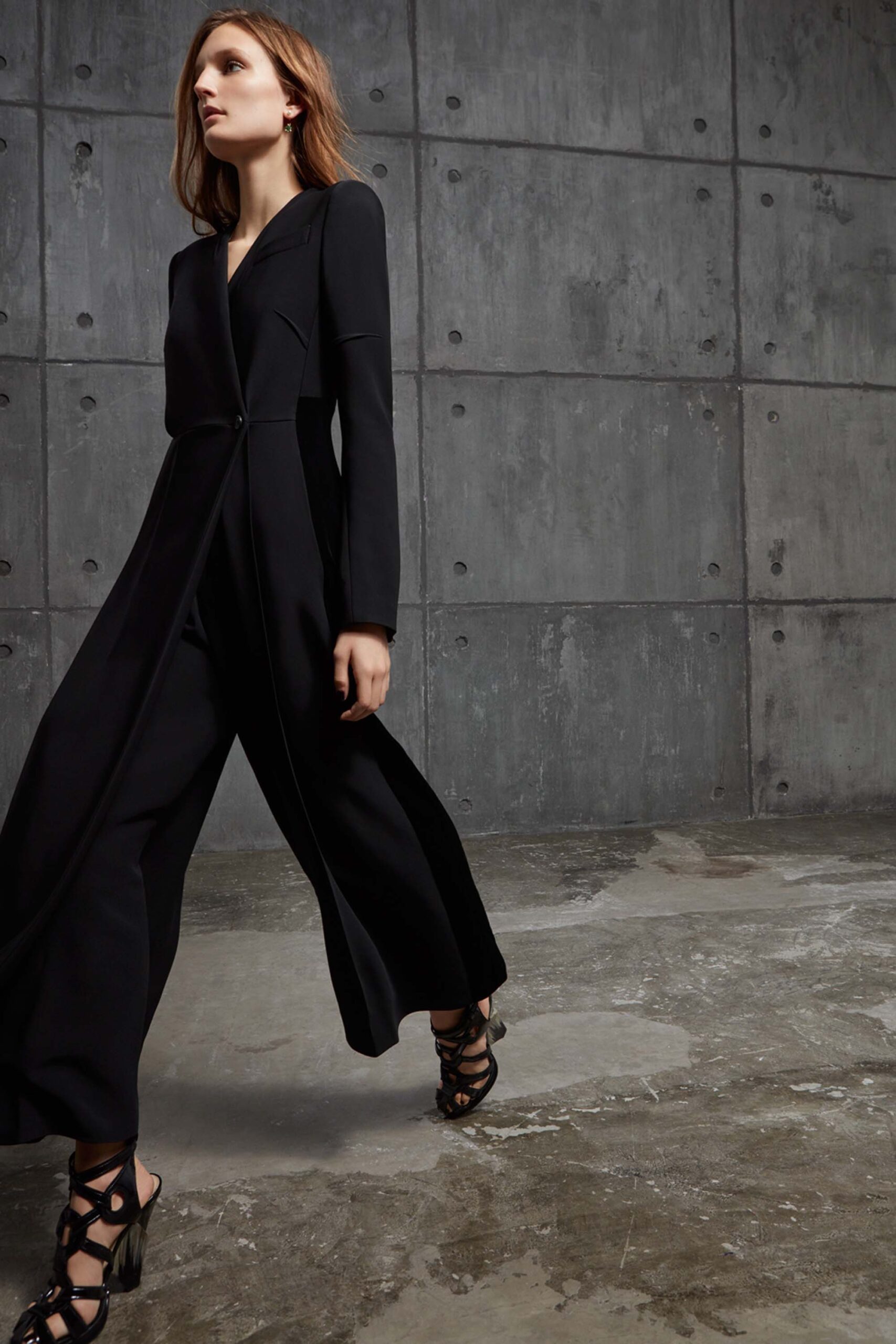 black fitted long-sleeve jumpsuit