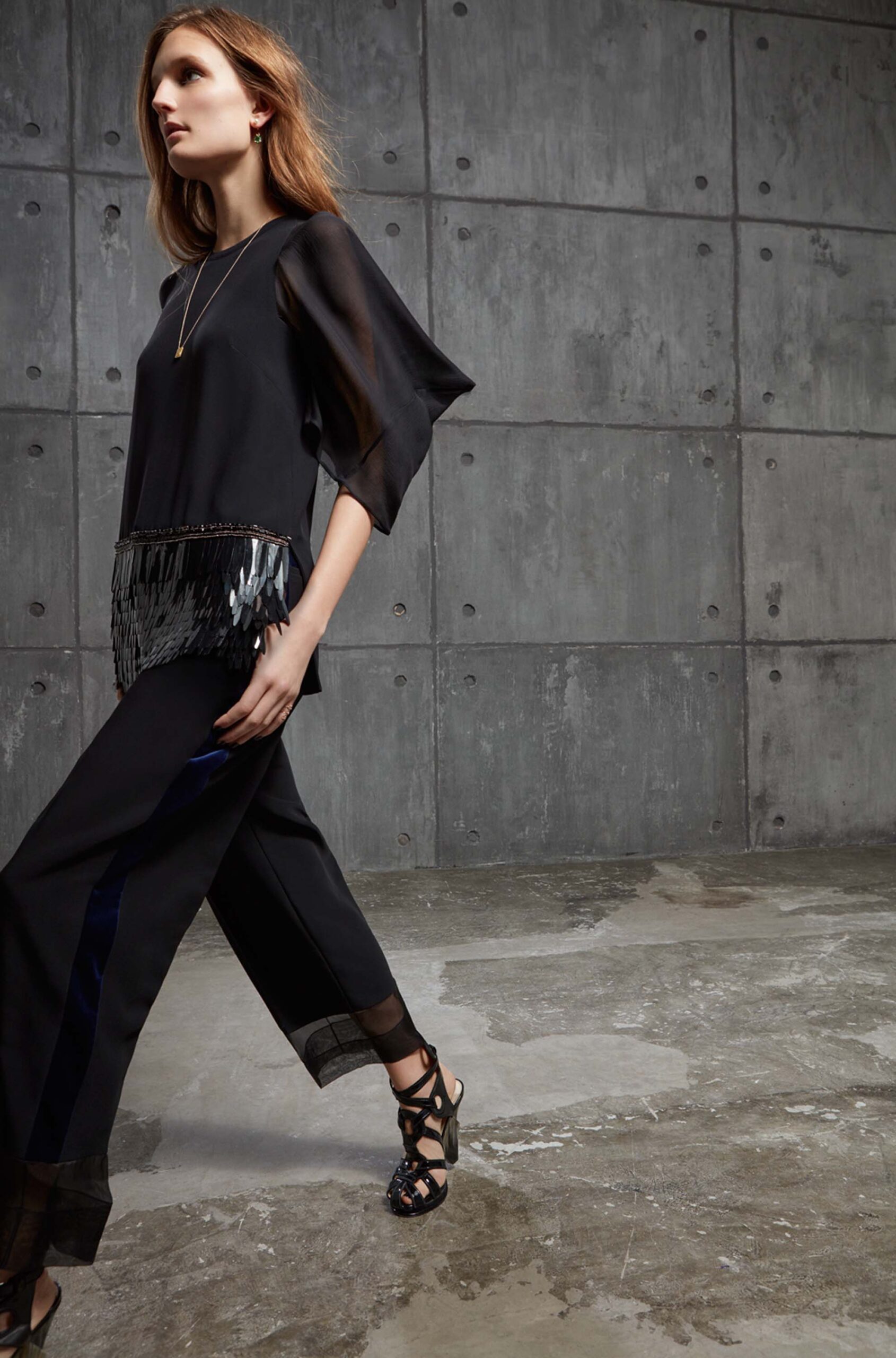 black silk top and tailored pants