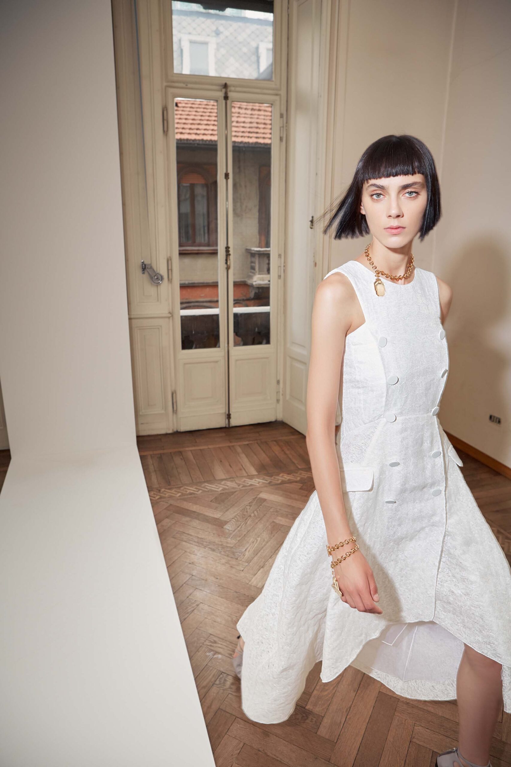 white fitted sleeveless dress