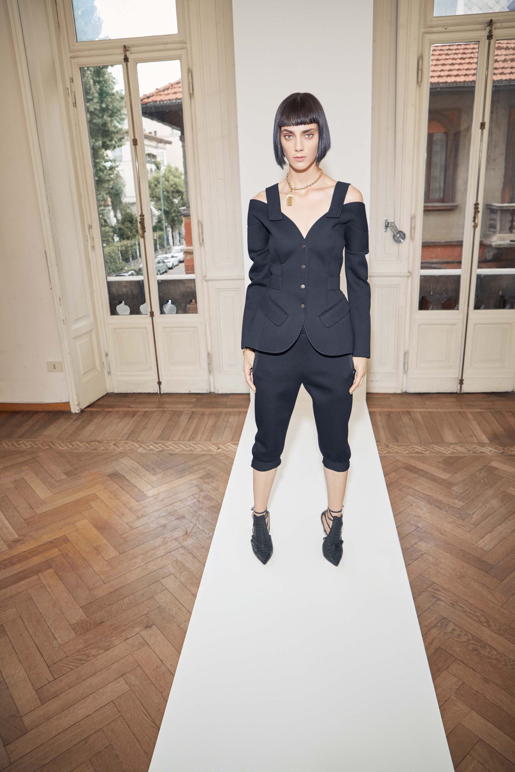 black fitted blazer and cropped pants