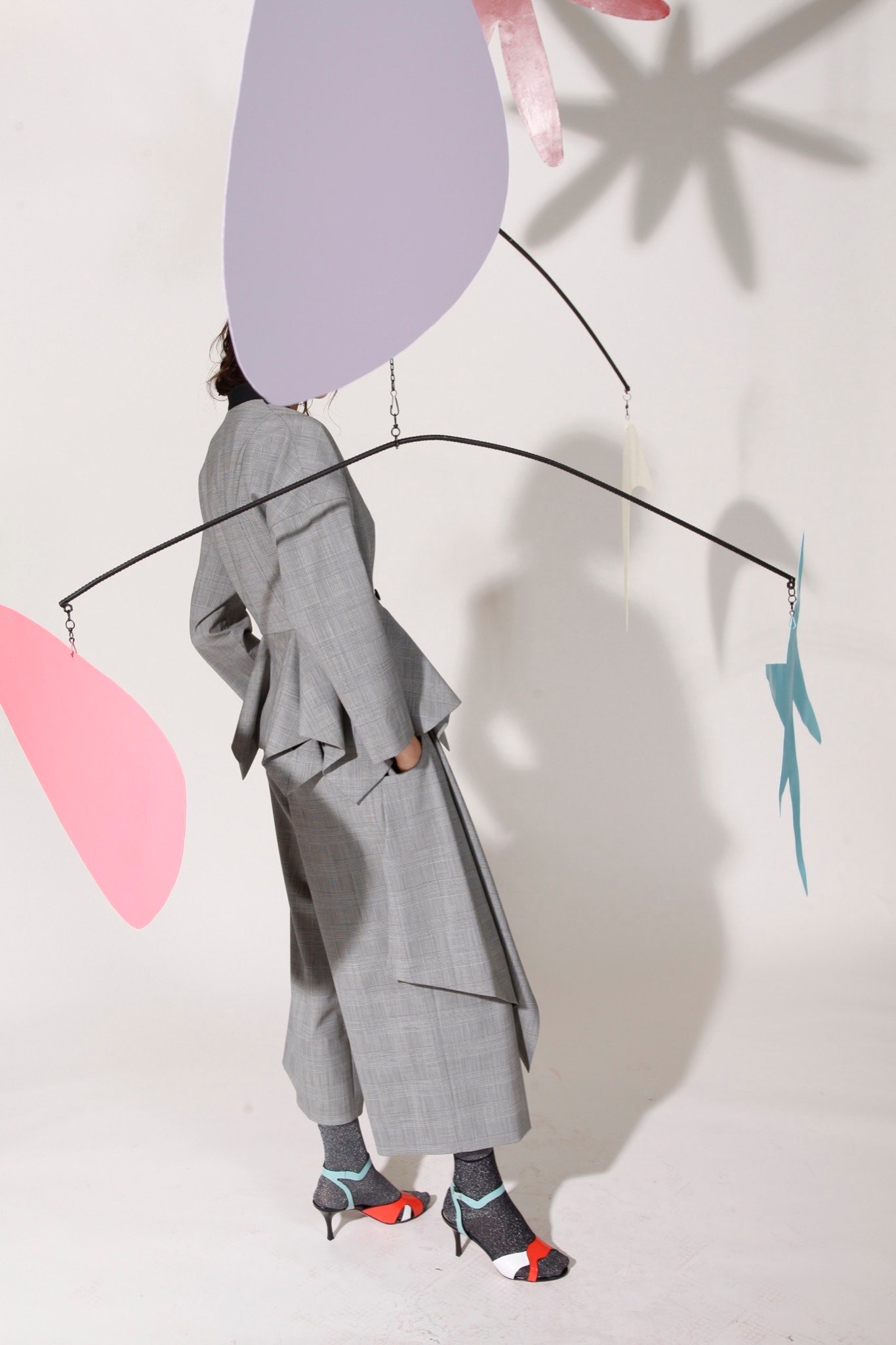 gray tailored jacket with wide-leg pants