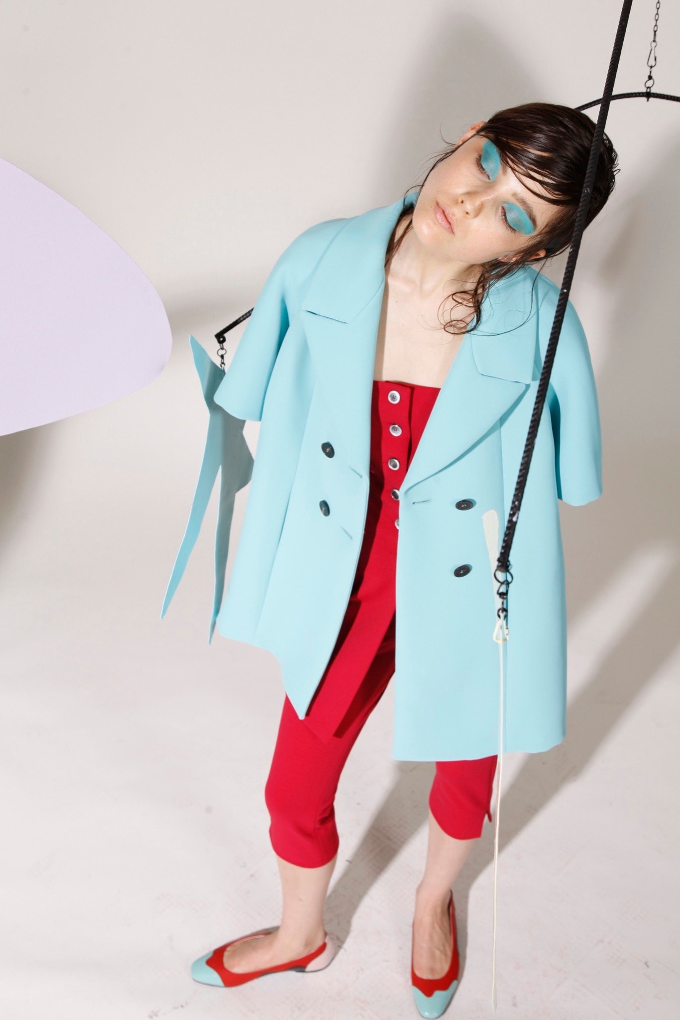 blue jacket red jumpsuit