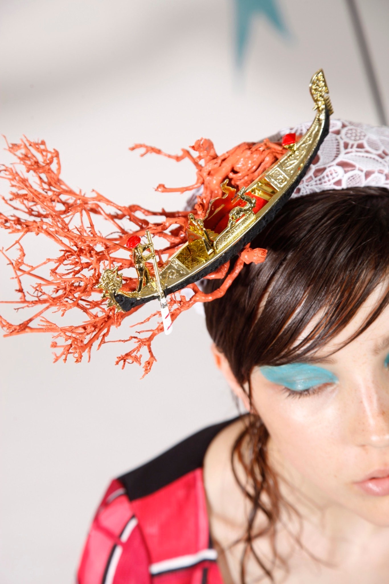 red and black color-blocked mini dress with embellished hat