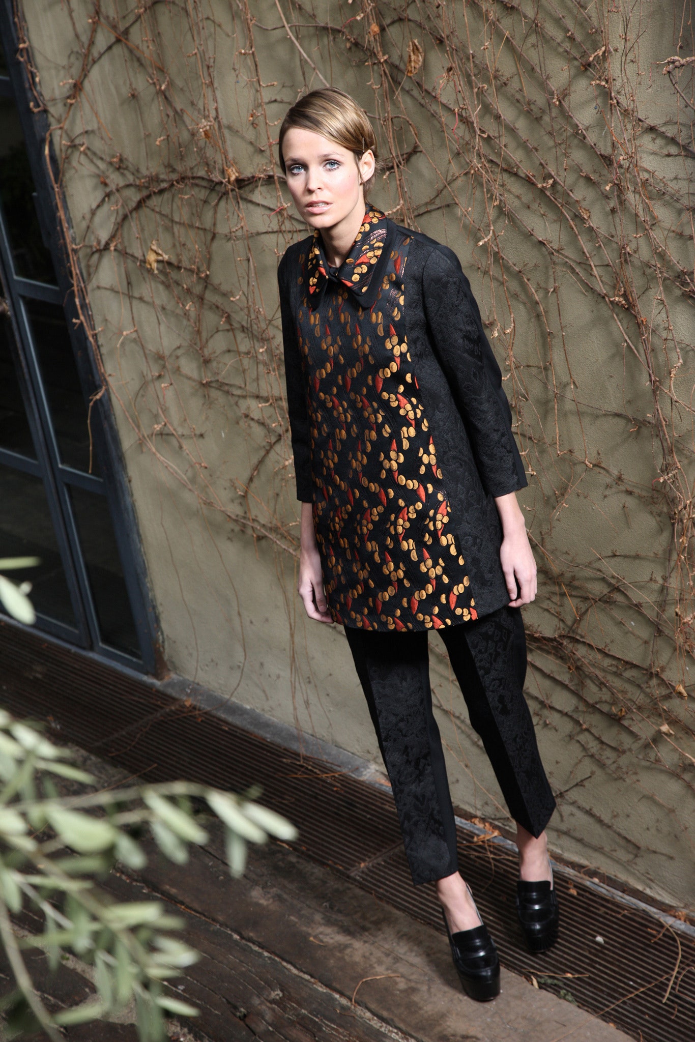 black printed top with fitted pants