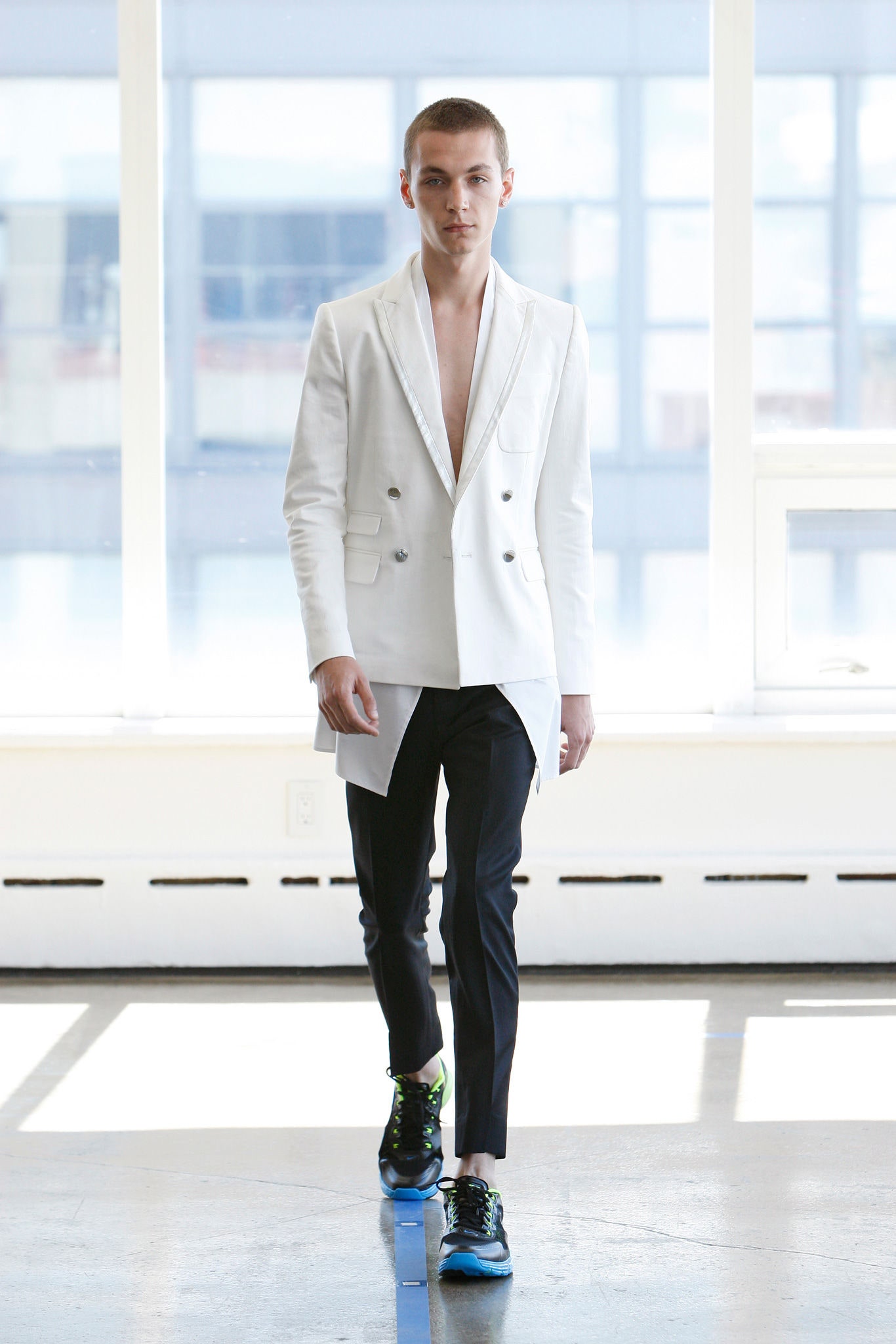 white tailored blazer with black pants