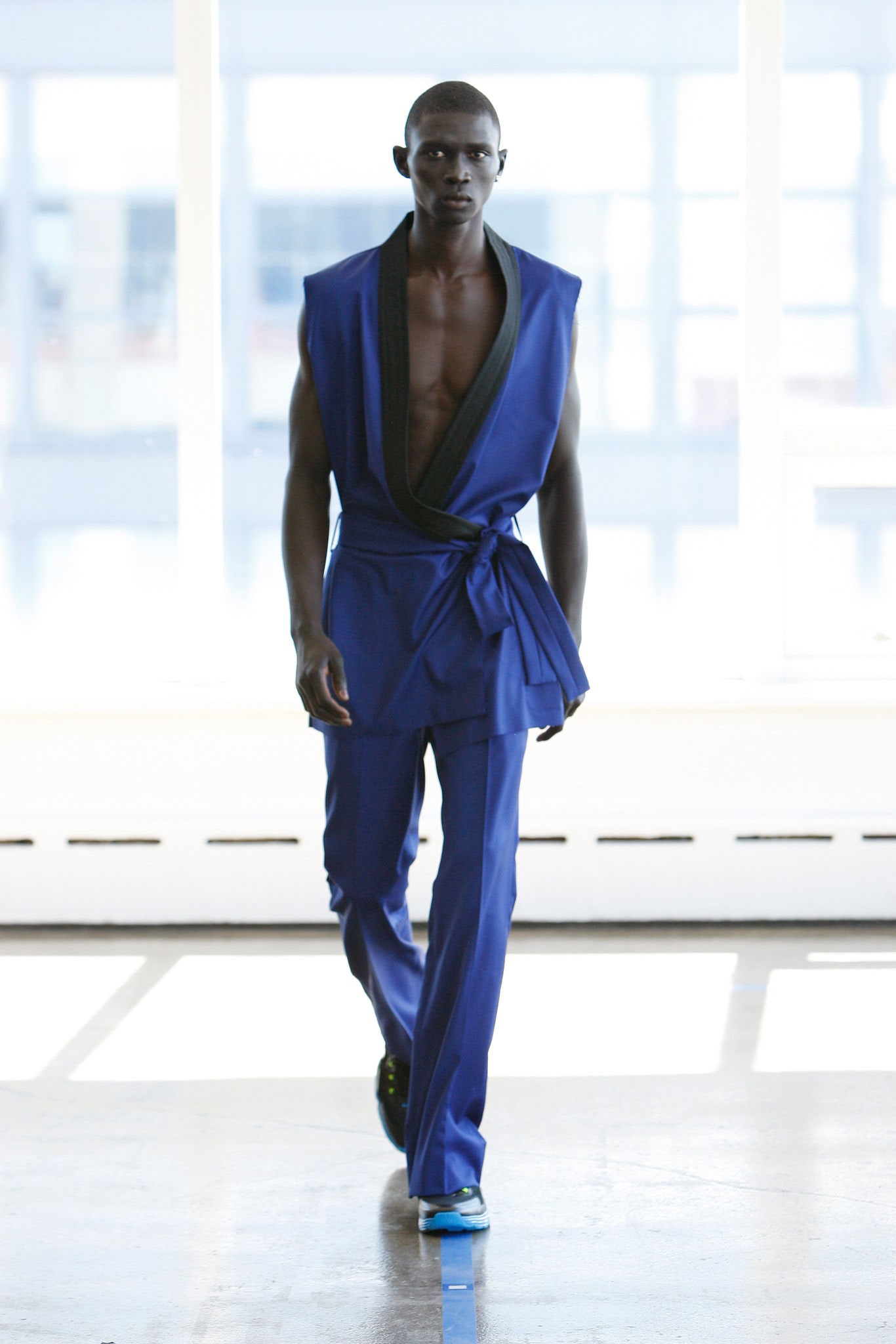 blue silk sleeveless v-neck fitted belted jacket