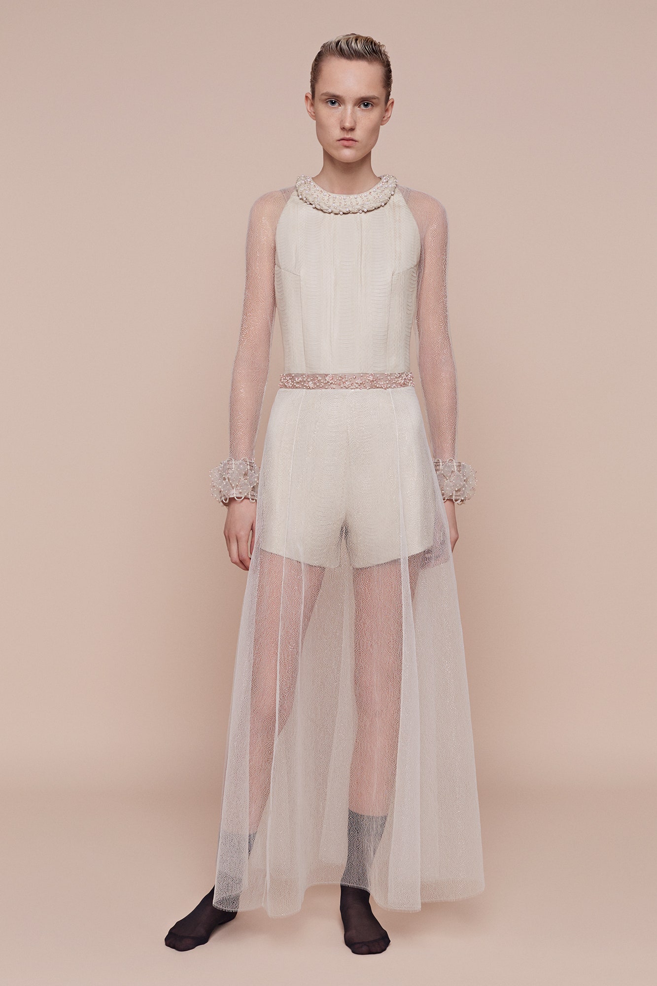 white silk romper with sheer cape