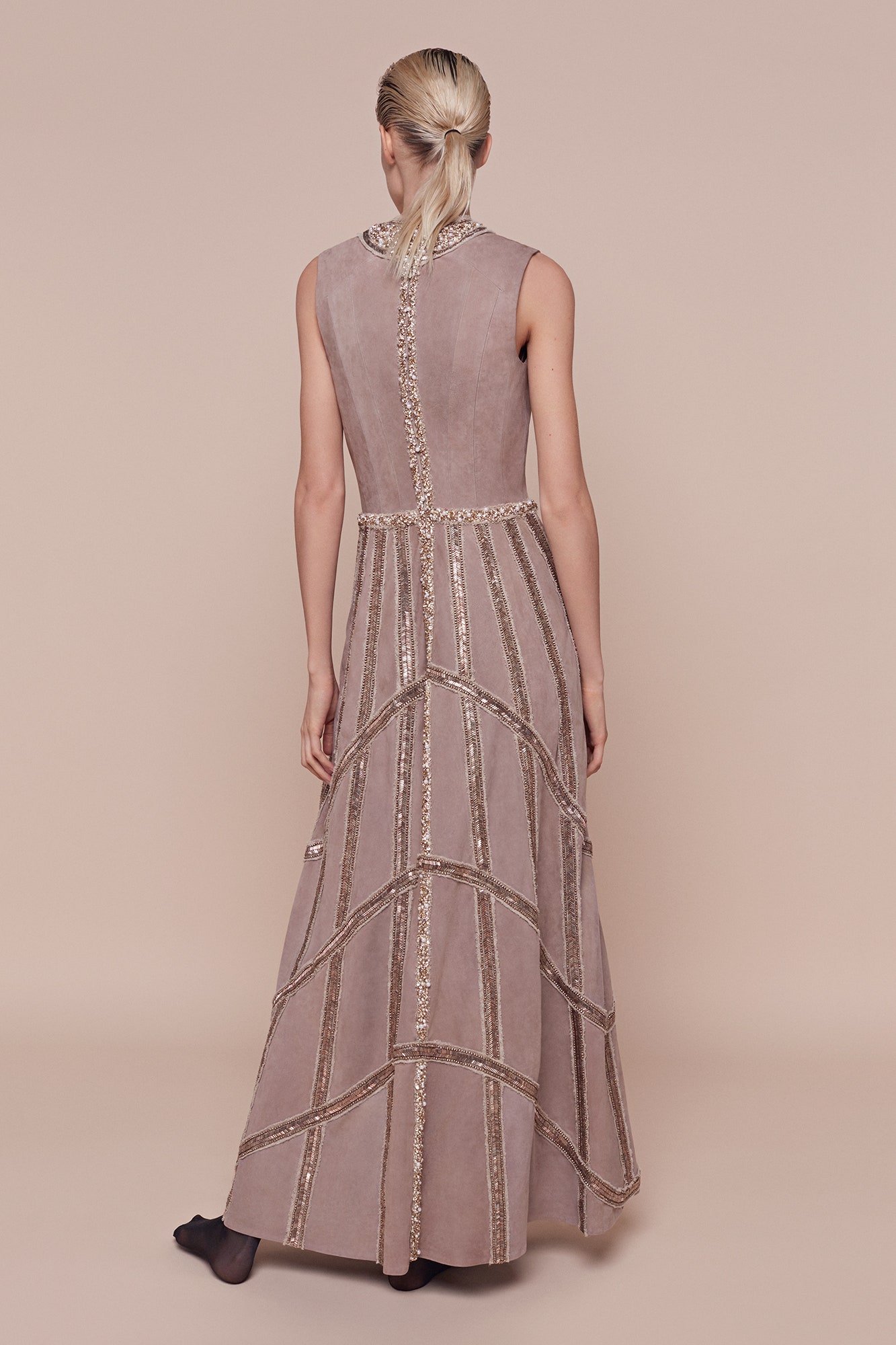beige velvet sleeveless gown