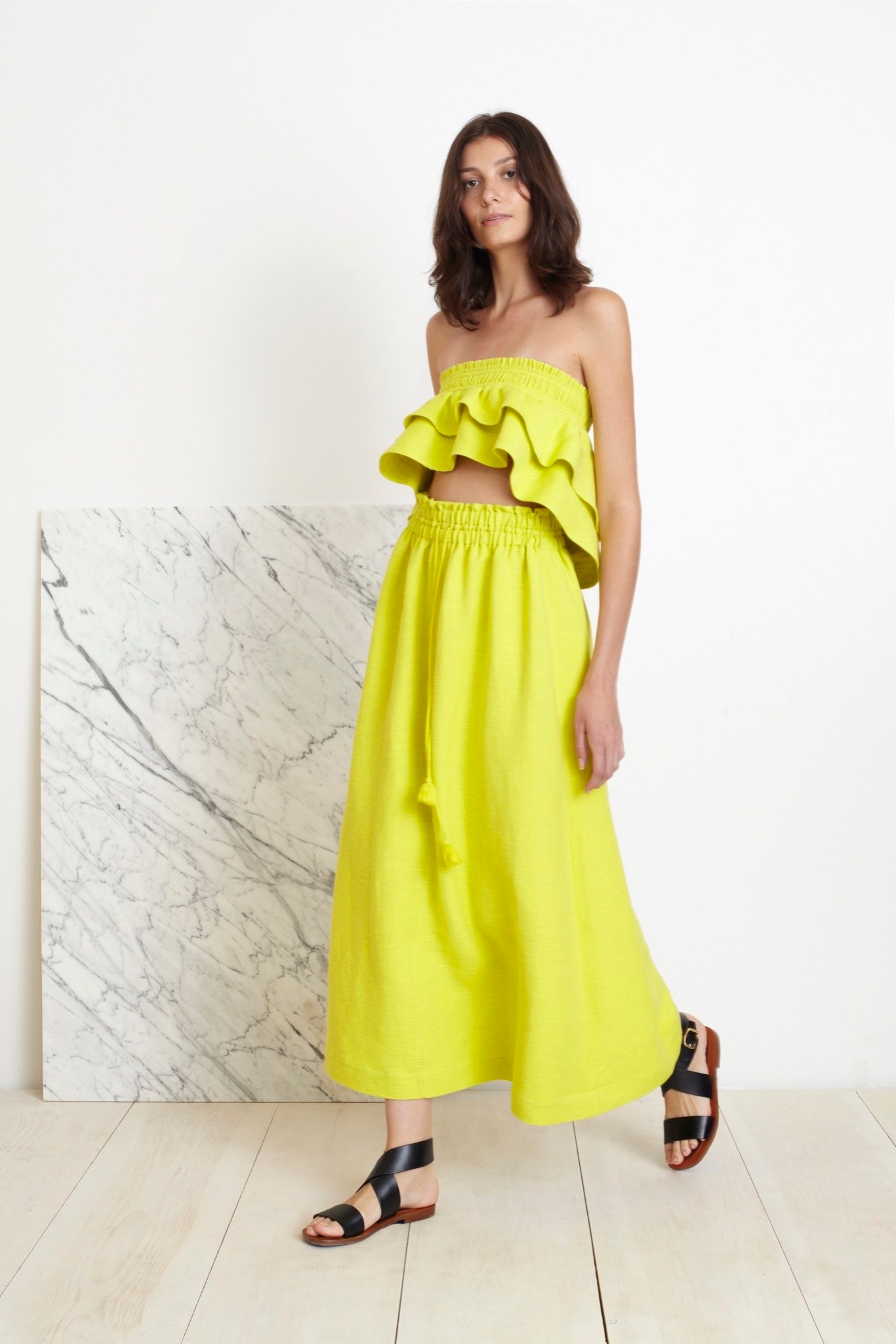 yellow ruffled top and maxi skirt