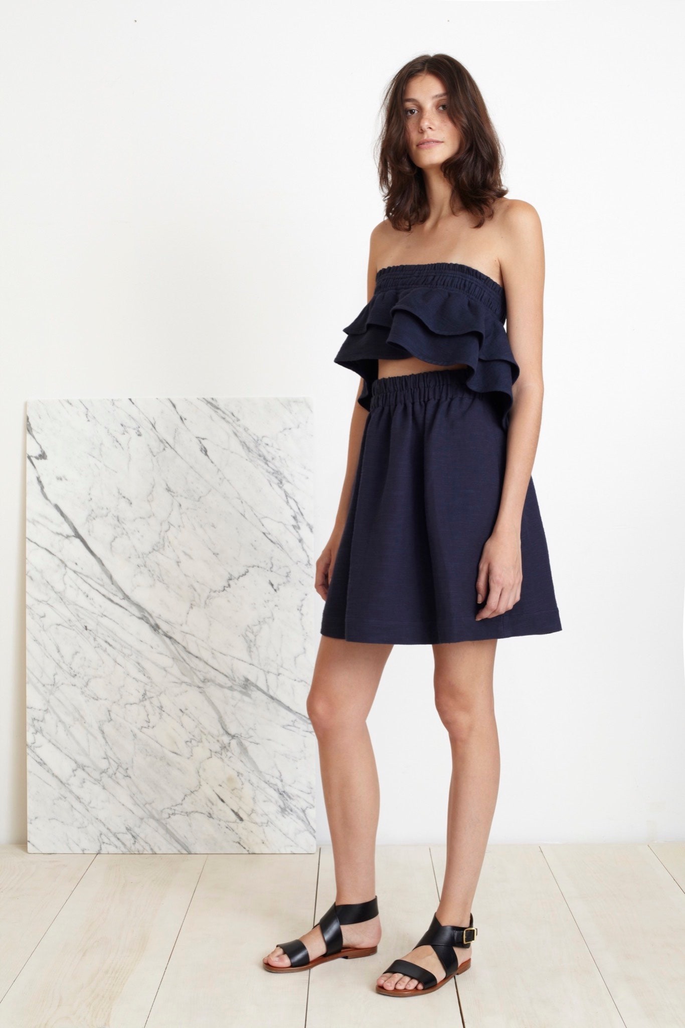 navy ruffled strapless dress