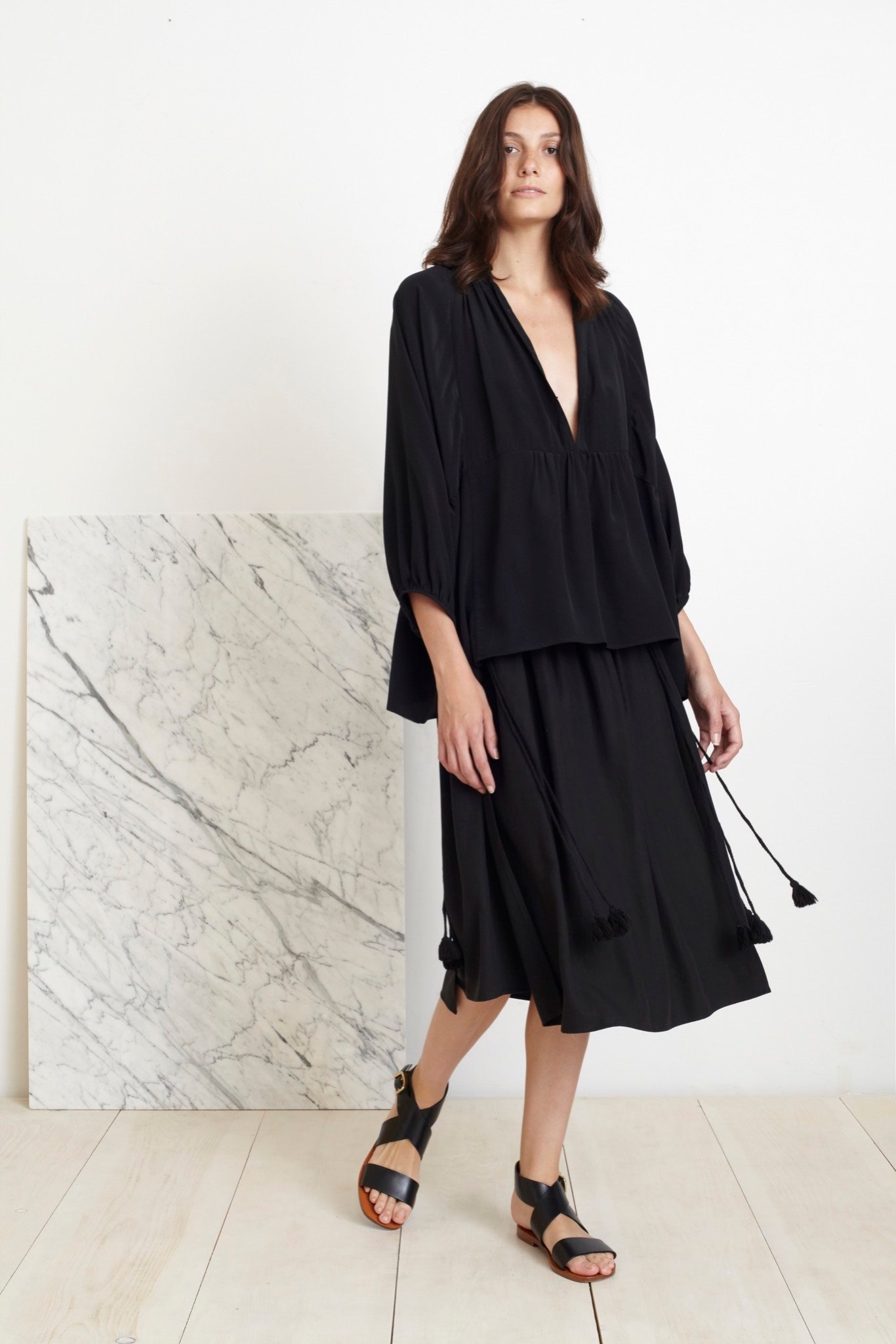 black silk relaxed top and midi skirt