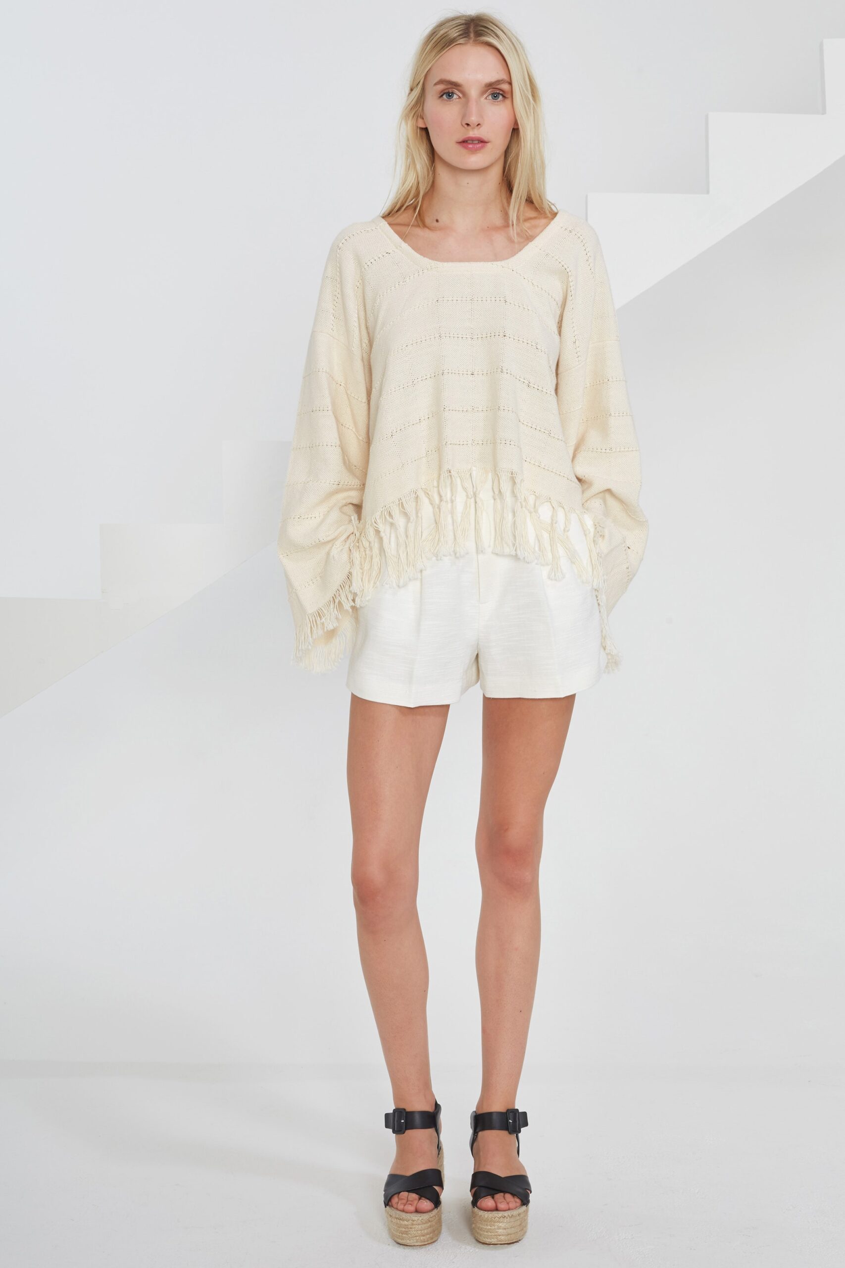 beige relaxed top with fringes