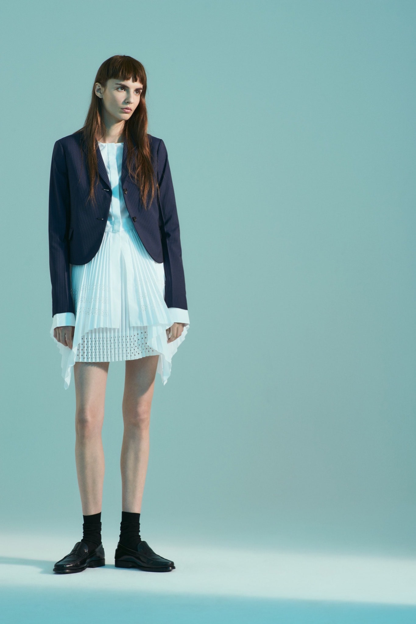 blue tailored blazer and white pleated dress