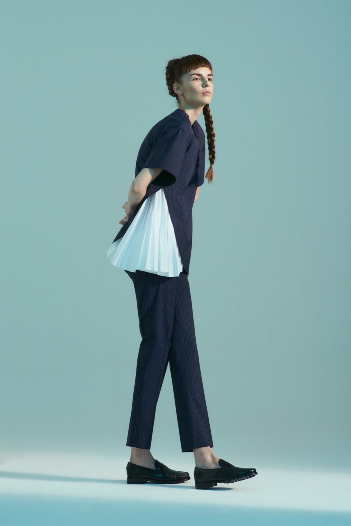 blue fitted top and slim pants