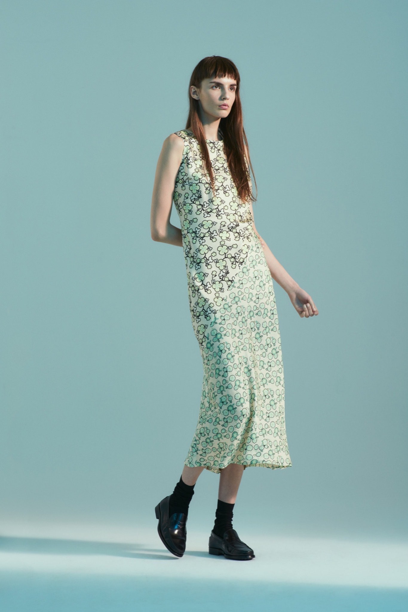 green and white printed midi dress