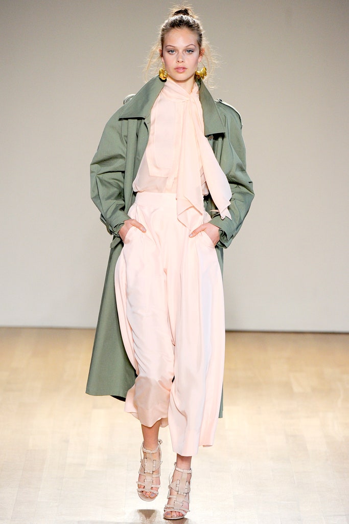 green trench coat with pink blouse