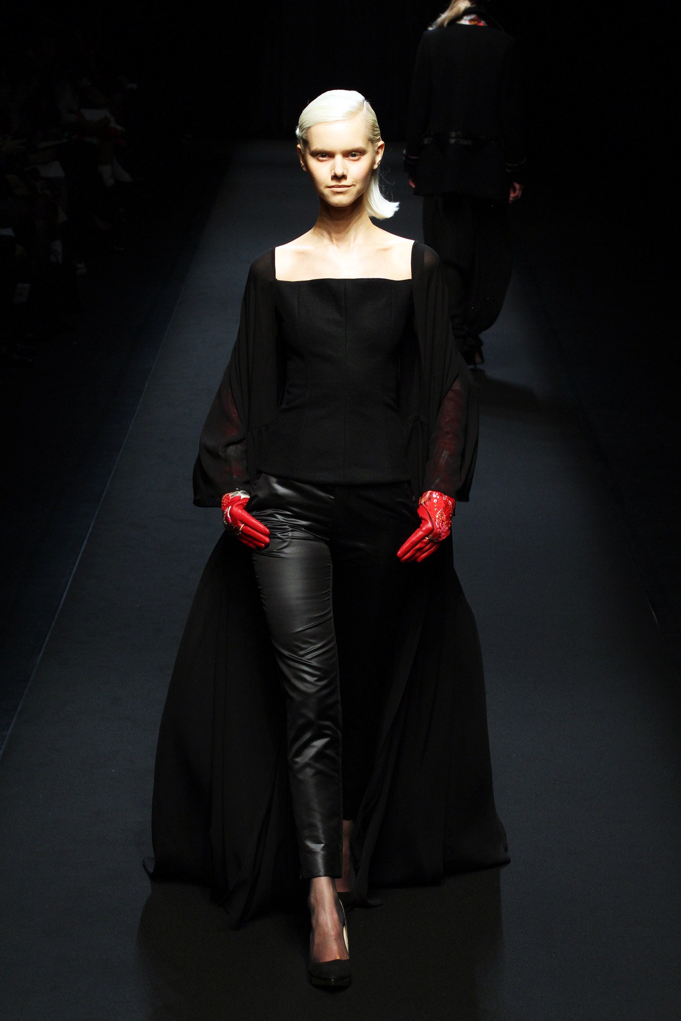 black fitted top with cape