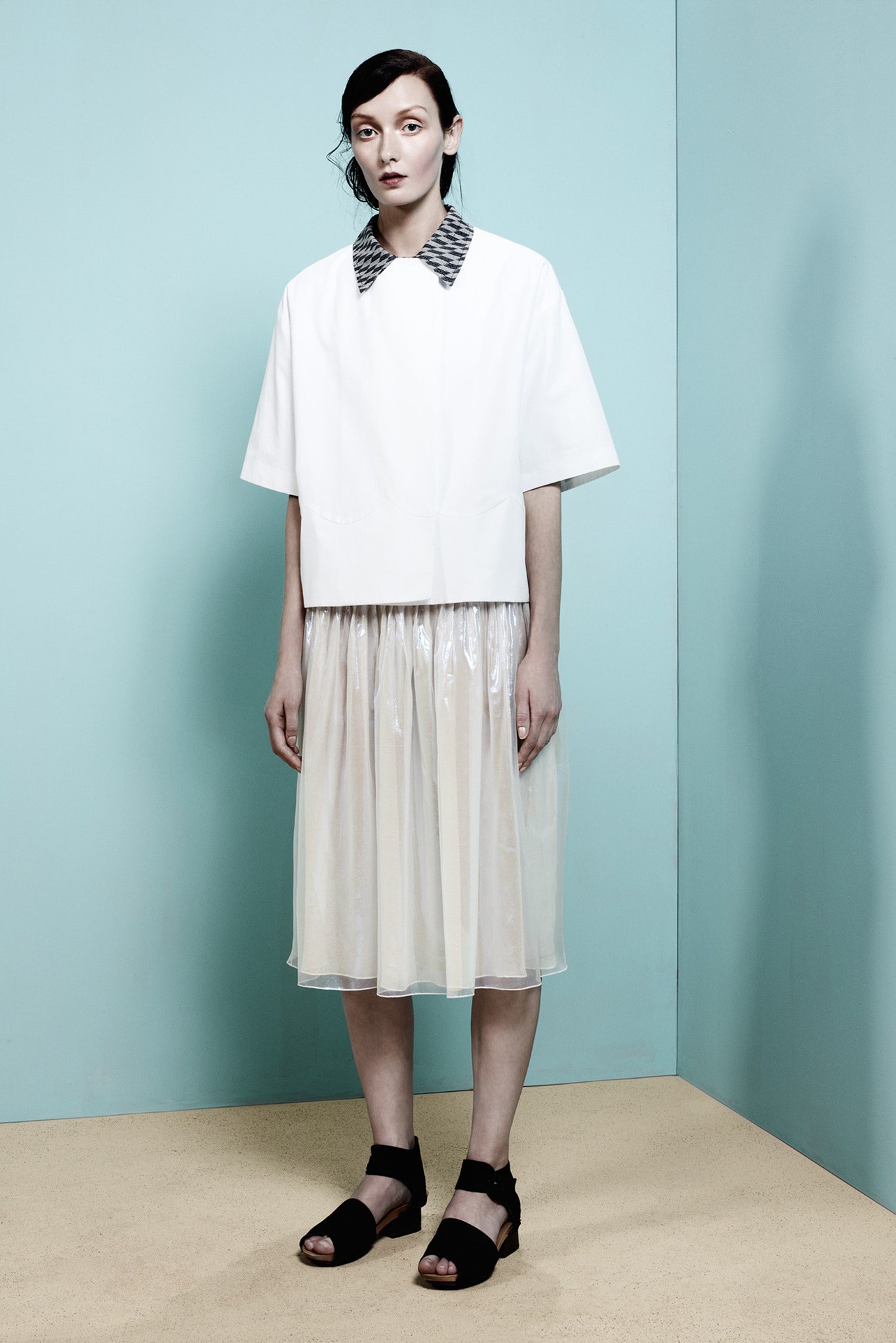 white relaxed top with pleated skirt