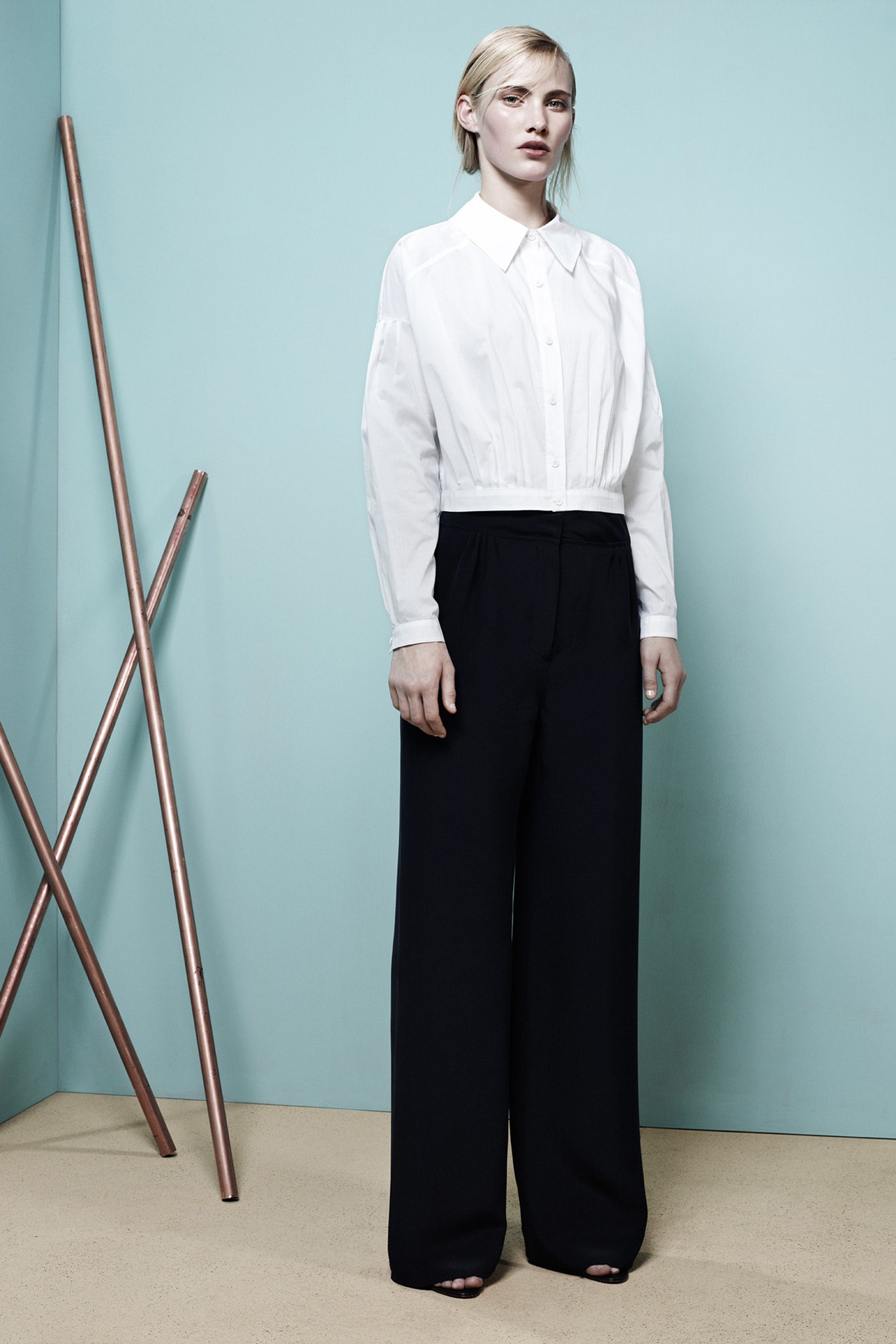 white fitted shirt and black wide-leg pants
