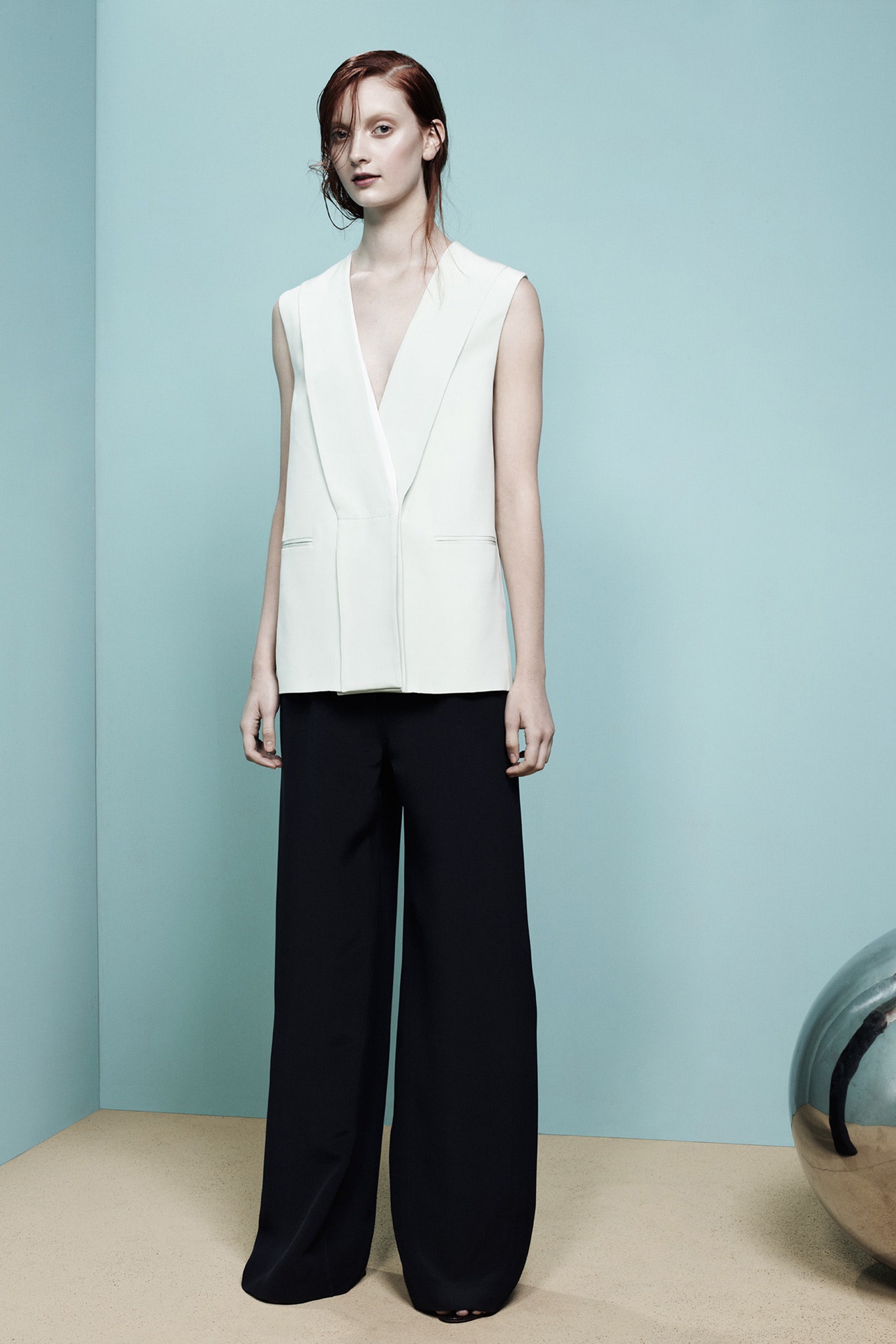 white tailored blazer and black wide-leg pants