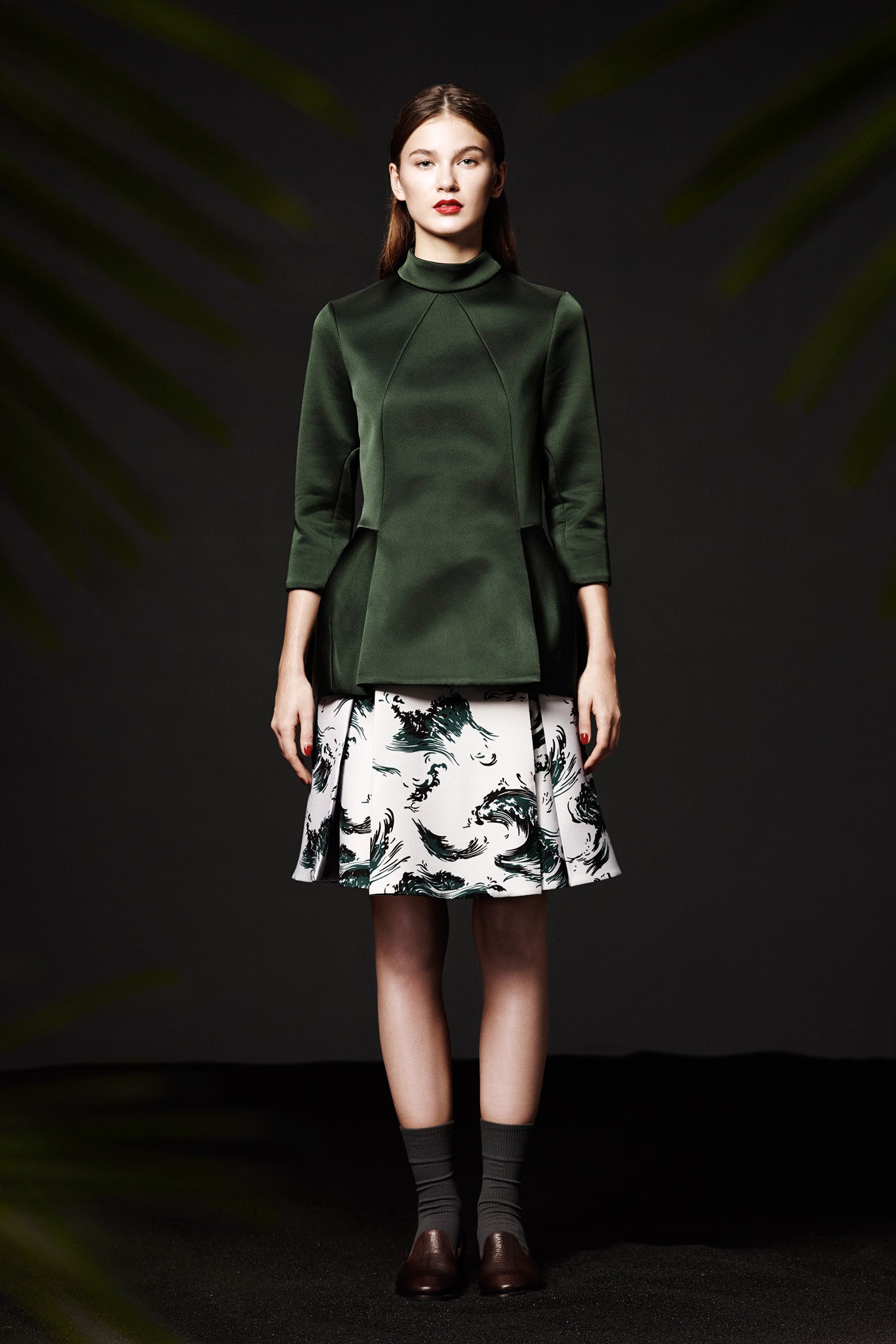green satin fitted top with printed skirt