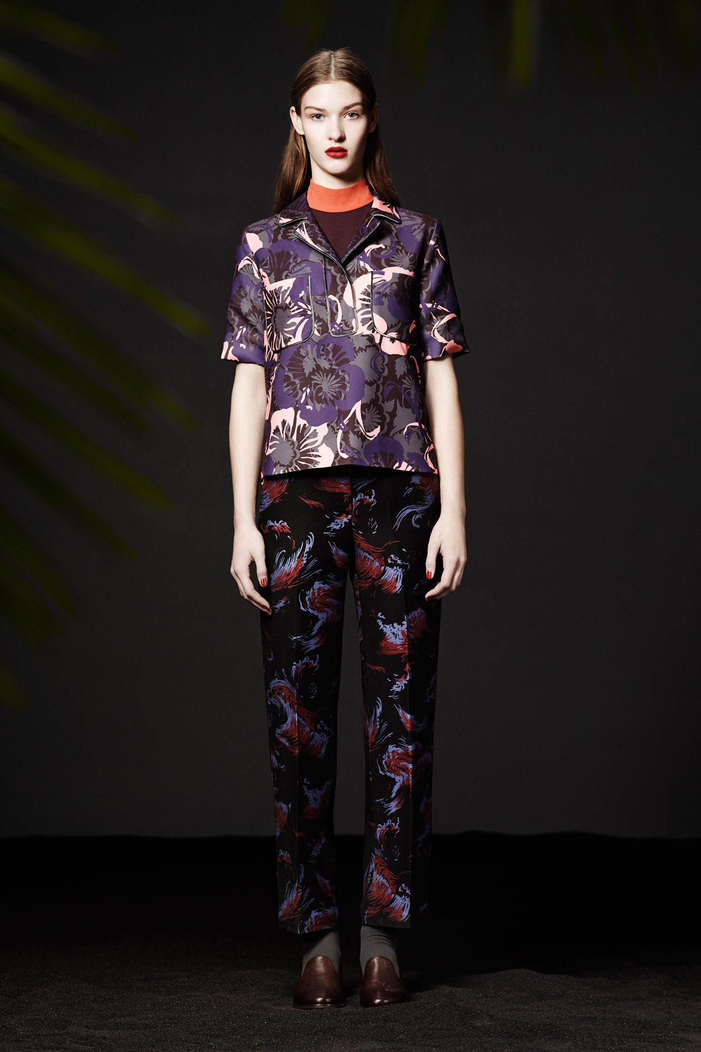 printed purple top and black pants