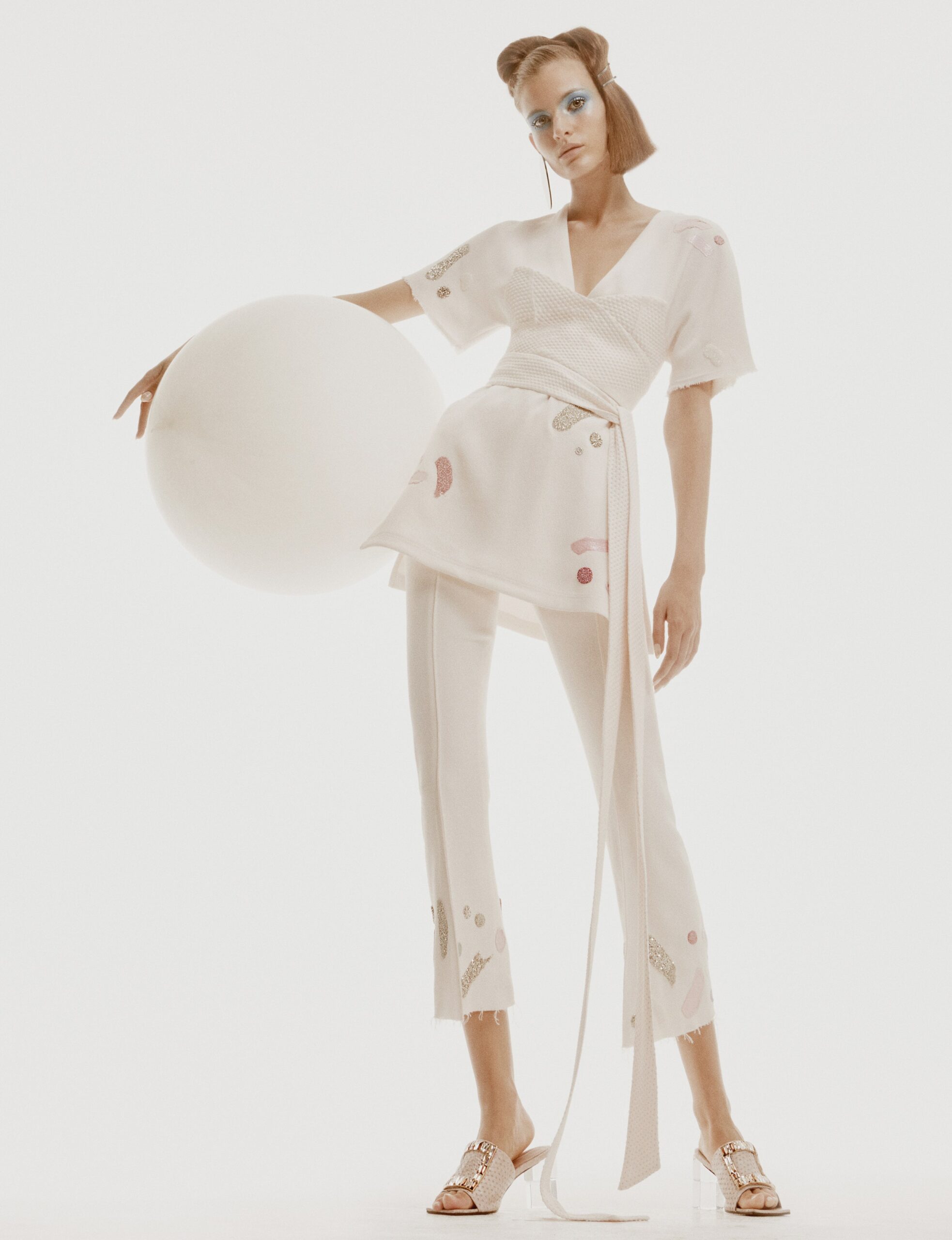 white fitted top and pants